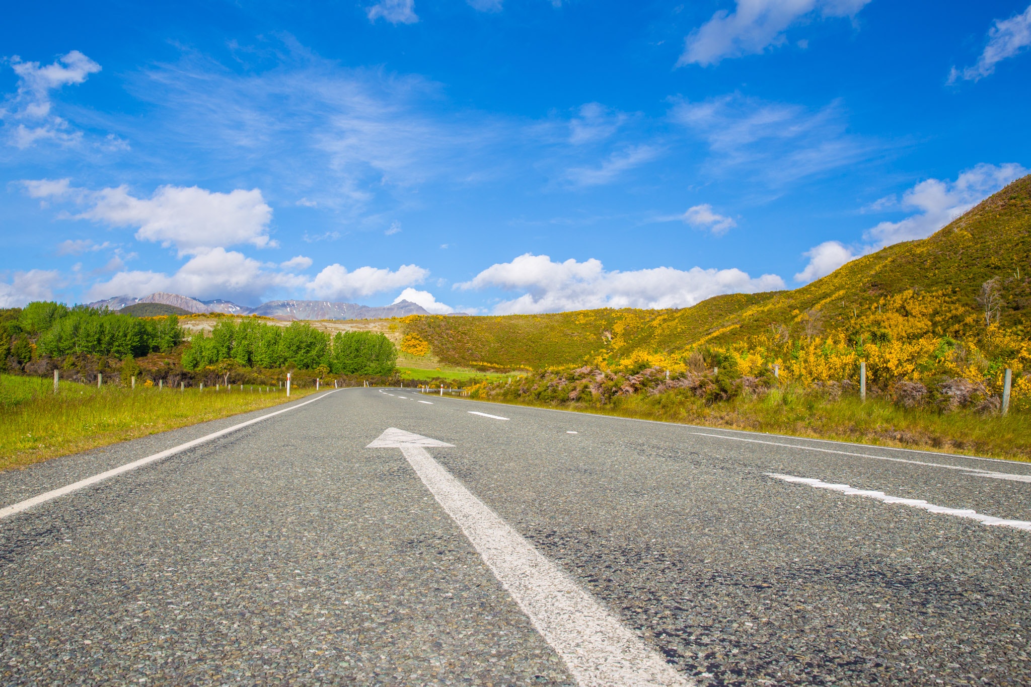 arrow-asphalt-blue-sky-313415.jpg