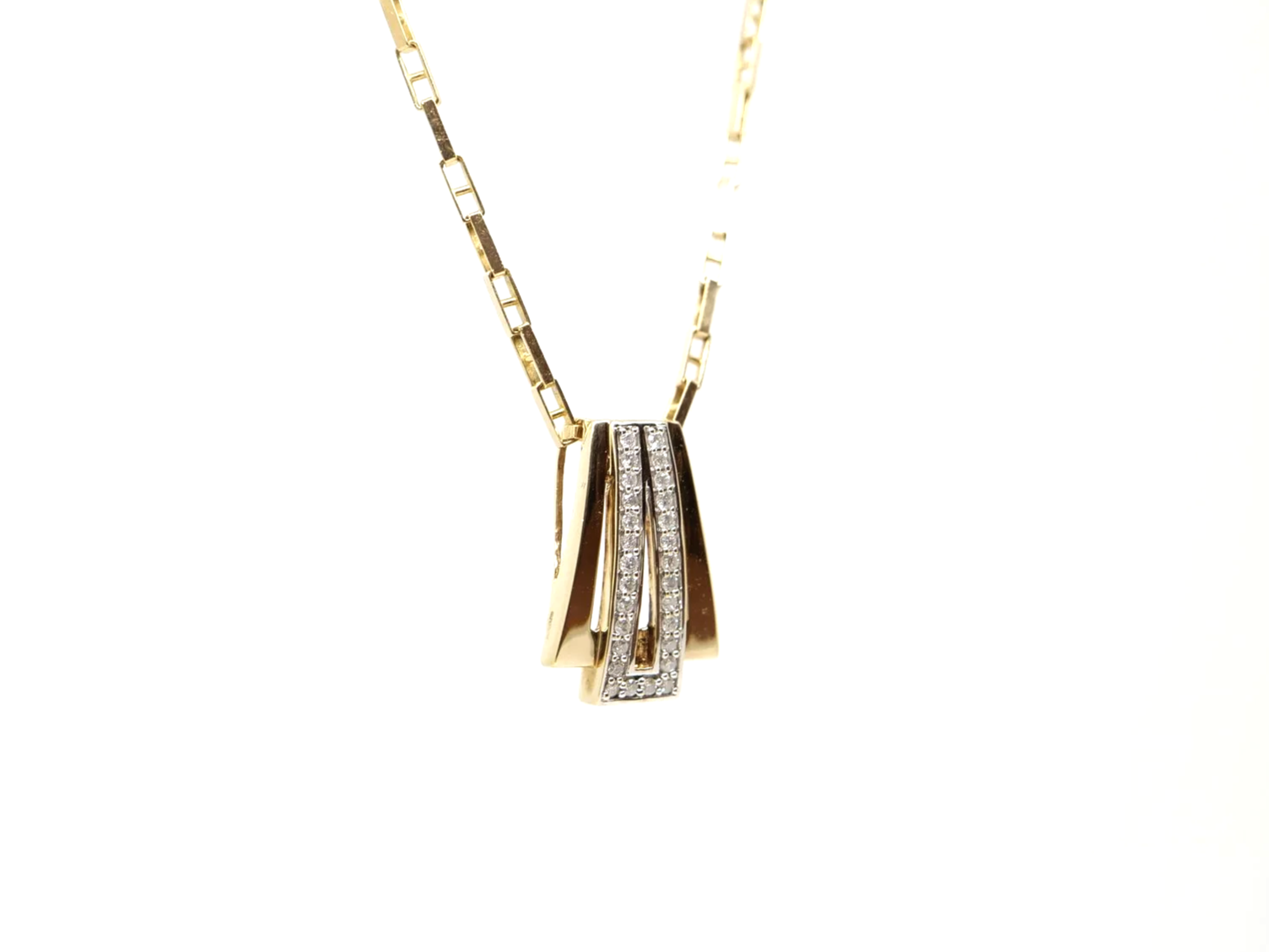 9ct gold diamond pendant necklace with a geometric Art Deco-style design, set with approximately 0.28ct of diamonds.