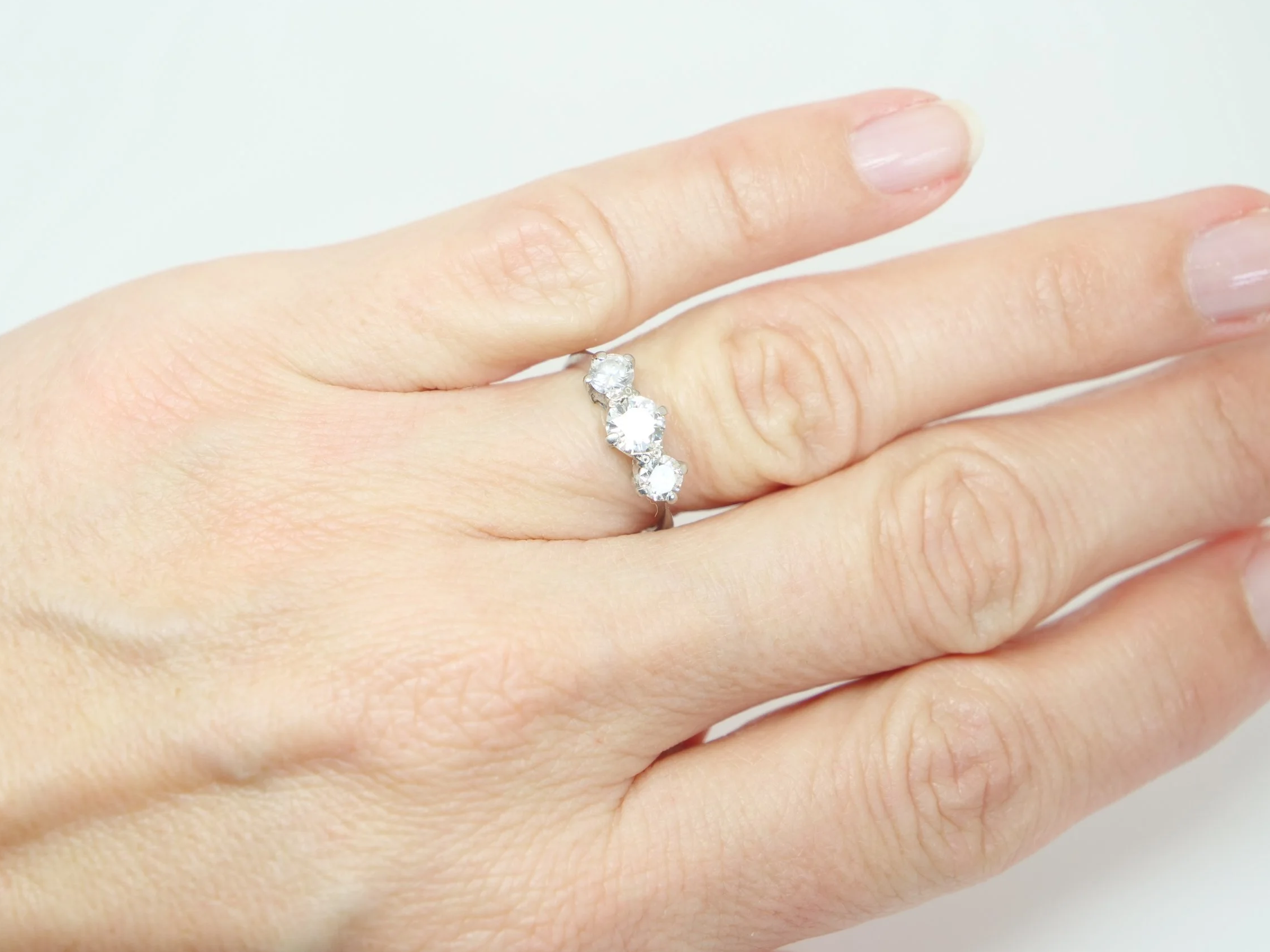 Classic vintage 18ct white gold diamond three-stone ring set with three round brilliant cut diamonds