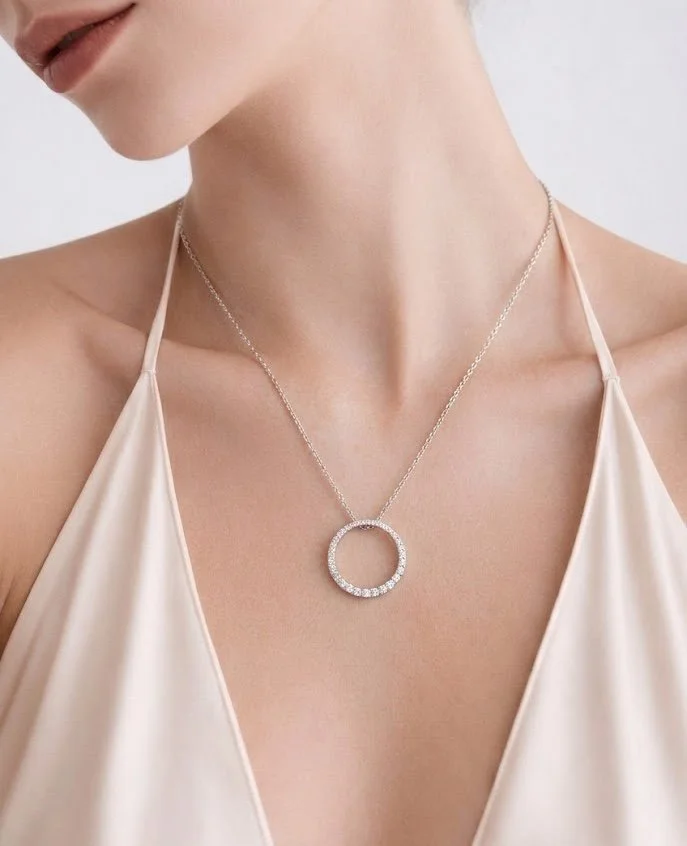 18ct graduated circular diamond pendant and chain.jpg