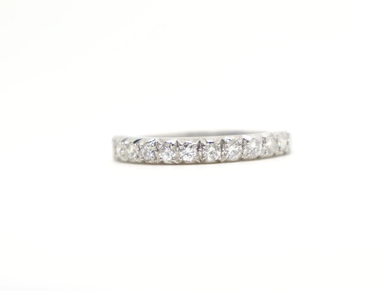 vintage 18ct gold diamond half eternity ring, set with a line of bright brilliant-cut diamonds totalling approximately 0.33ct.