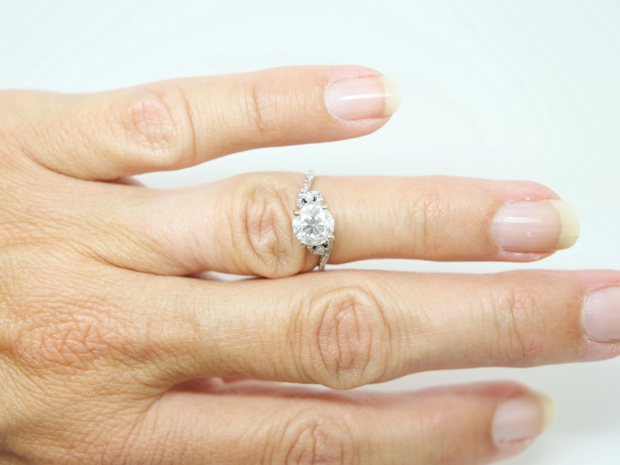 18ct gold diamond solitaire ring, 1.38ct central brilliant cut diamond with diamond set sides, UK size I