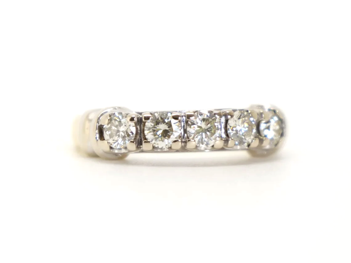 Unusual vintage 18ct gold diamond five stone ring, with five very sparkly brilliant cut diamonds in a scalloped setting.