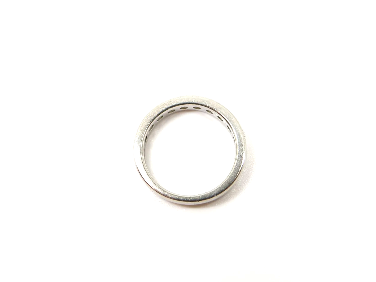 platinum channel-set diamond half eternity ring set