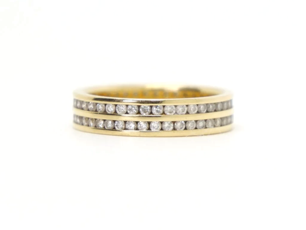 Beautiful 18ct gold double row diamond full eternity ring, set with approximately 1.2ct brilliant cut diamonds.