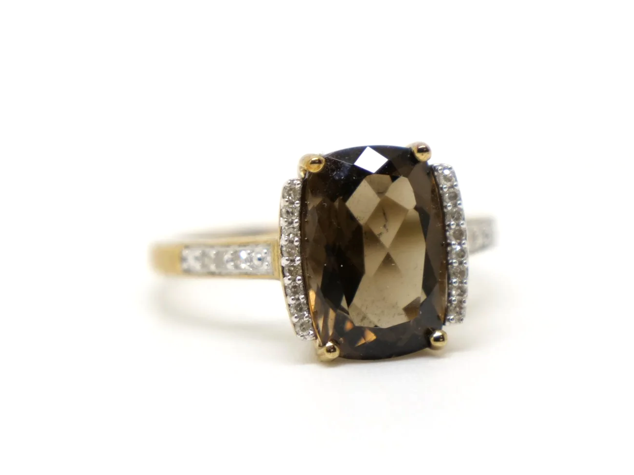Very pretty 9ct gold smoky quartz and diamond cocktail ring, set with a chequerboard cushion cut smokey quartz and with diamonds to each side and down each shoulder.