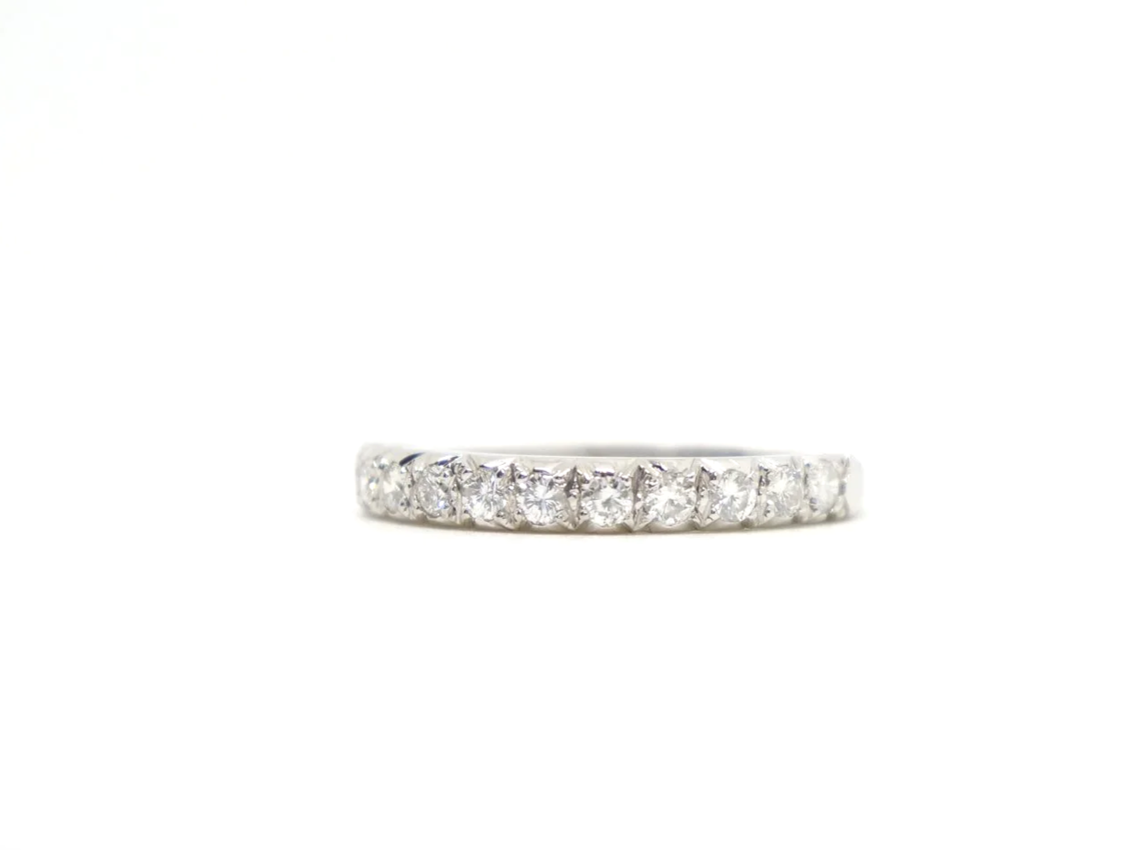 vintage 18ct gold diamond half eternity ring, set with a line of bright brilliant-cut diamonds totalling approximately 0.33ct.