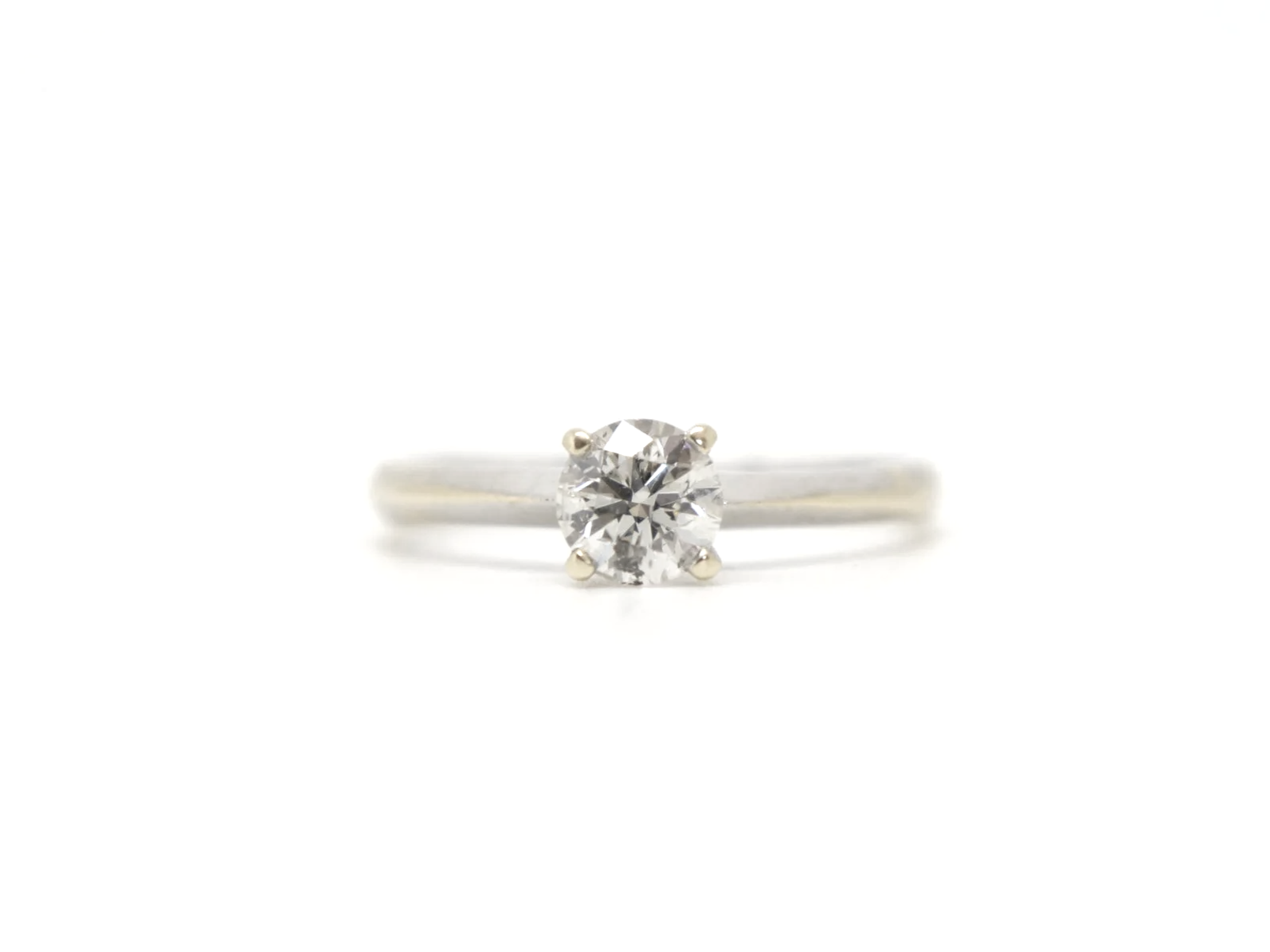 A clean, classic diamond solitaire in 14ct gold with a 0.5ct diamond