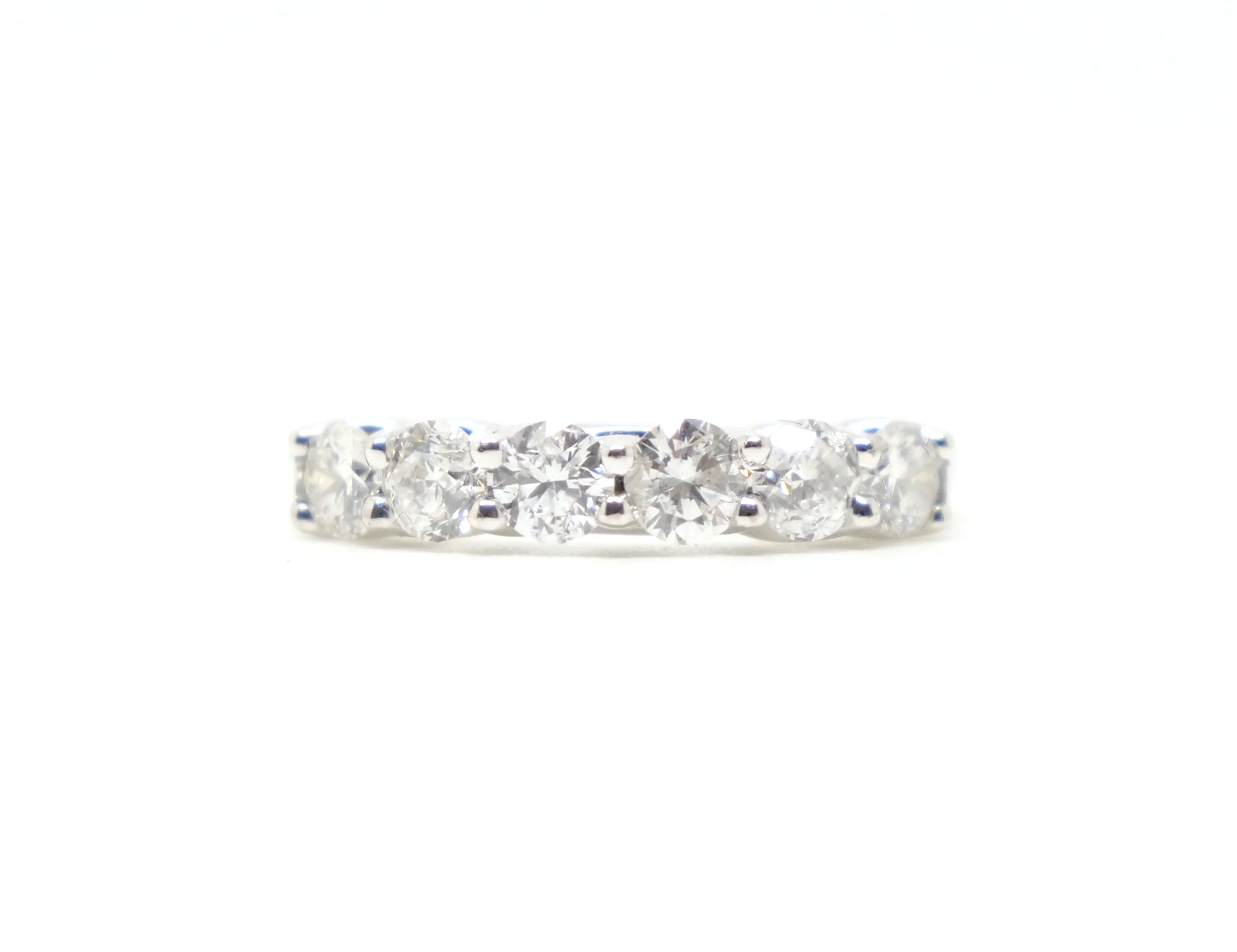 Classic platinum diamond half eternity ring, set with six brilliant cut diamonds with a total diamond weight of 1ct.