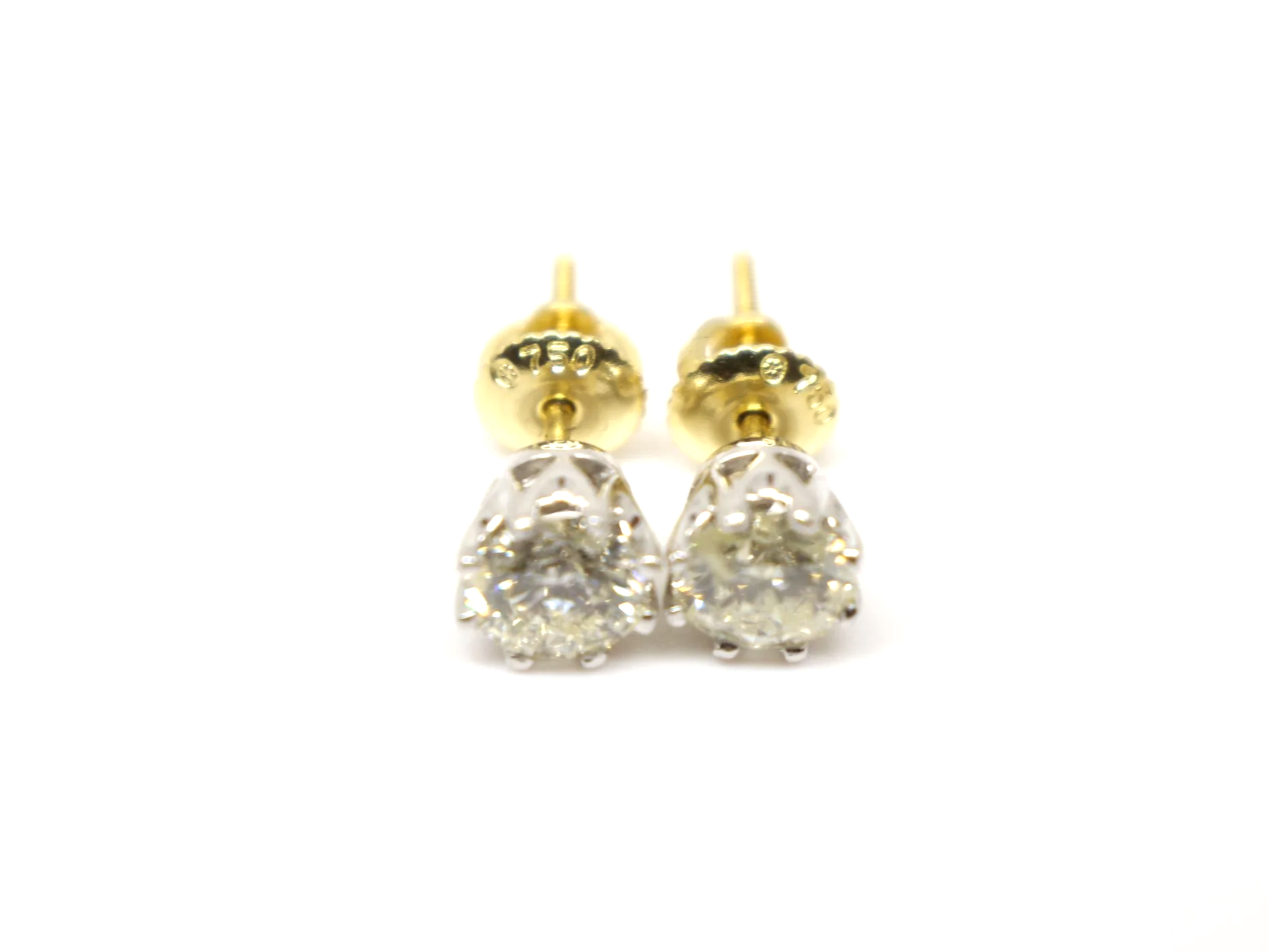 Lovely pair of 18ct white gold diamond stud earrings, each set with a round brilliant cut diamond of approximately 0.85 carats.