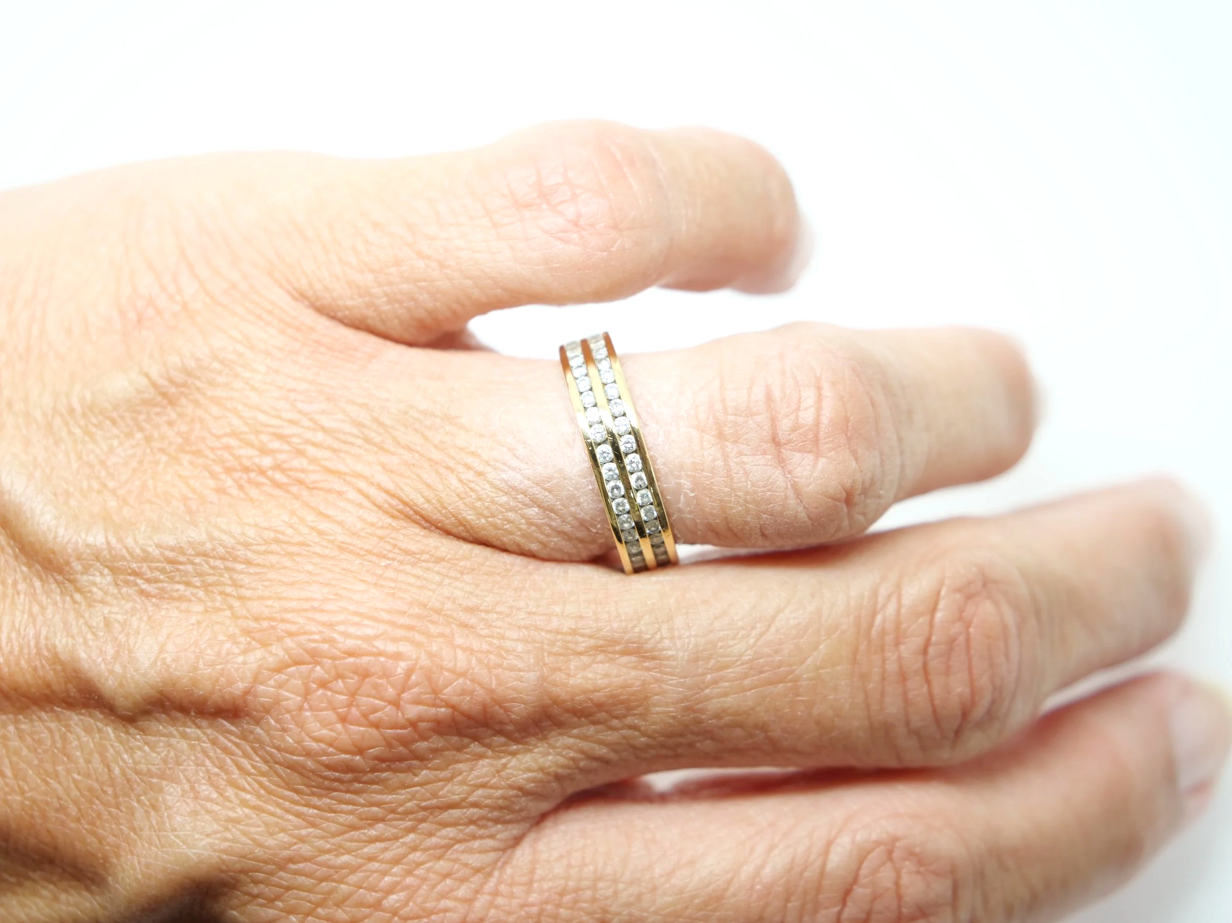Beautiful 18ct gold double row diamond full eternity ring, set with approximately 1.2ct brilliant cut diamonds.