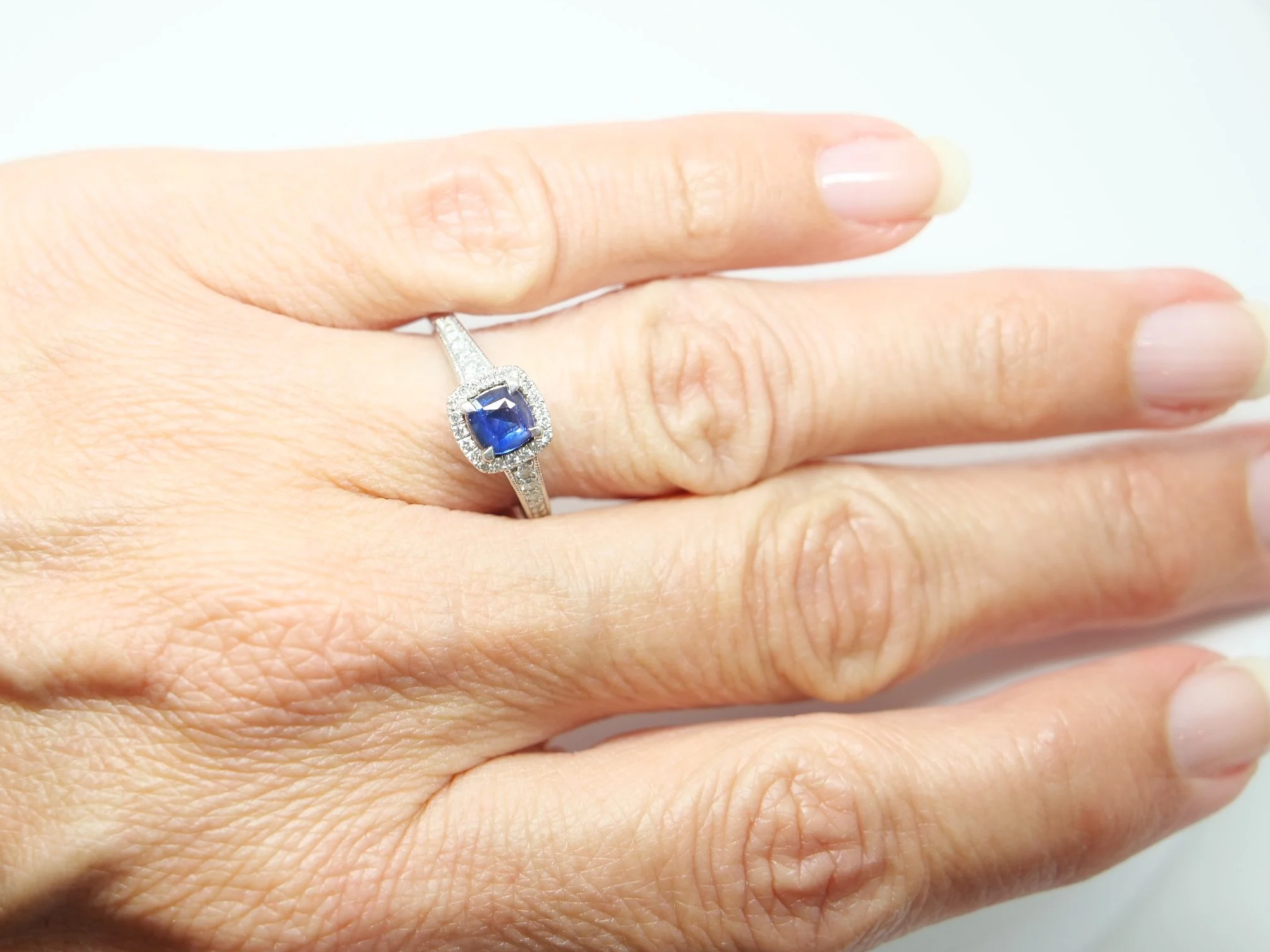 platinum sapphire and diamond halo ring vintage design