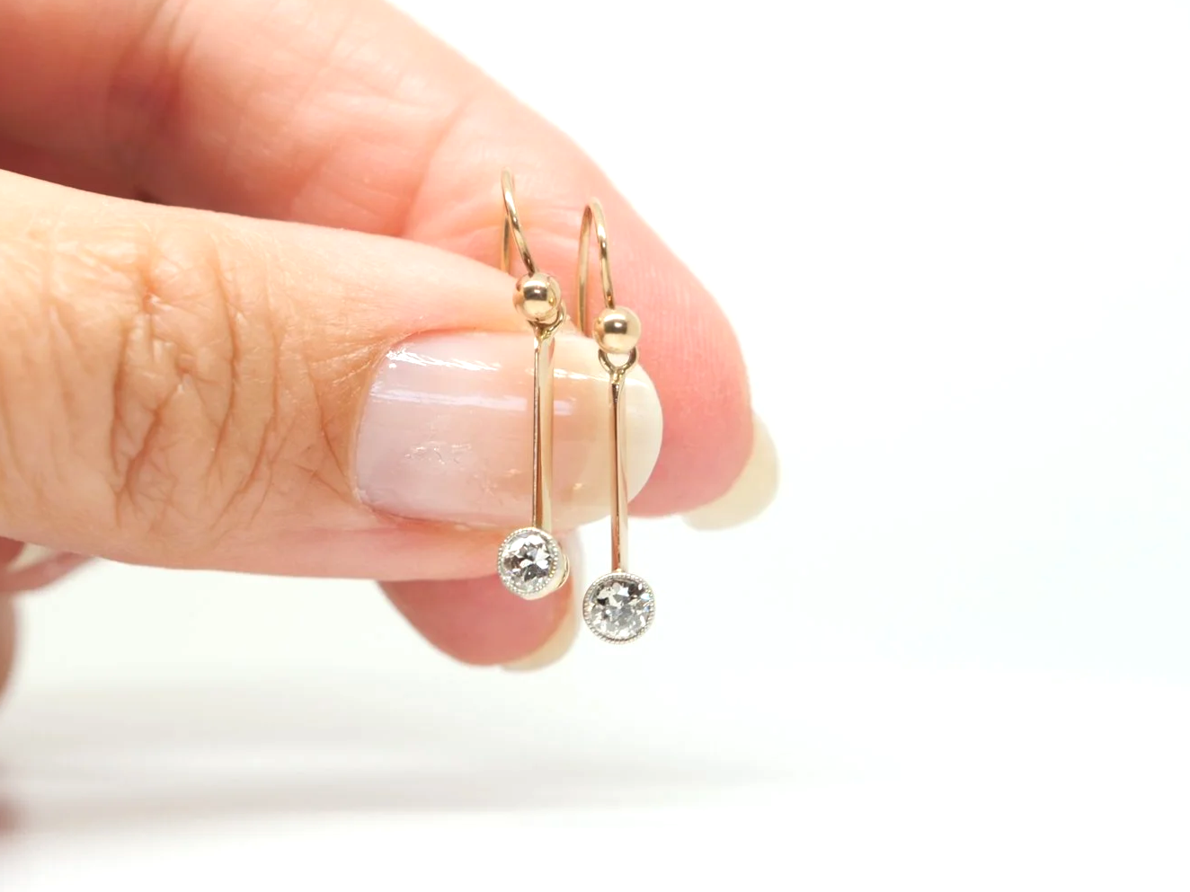 A pair of vintage 15ct gold diamond drop earrings