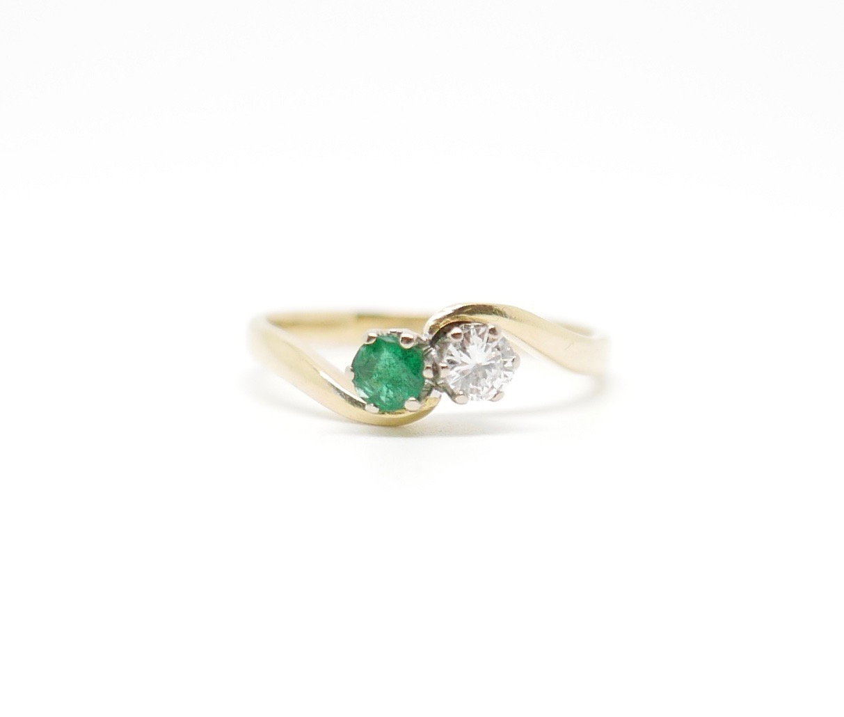 emerald and diamond twist ring