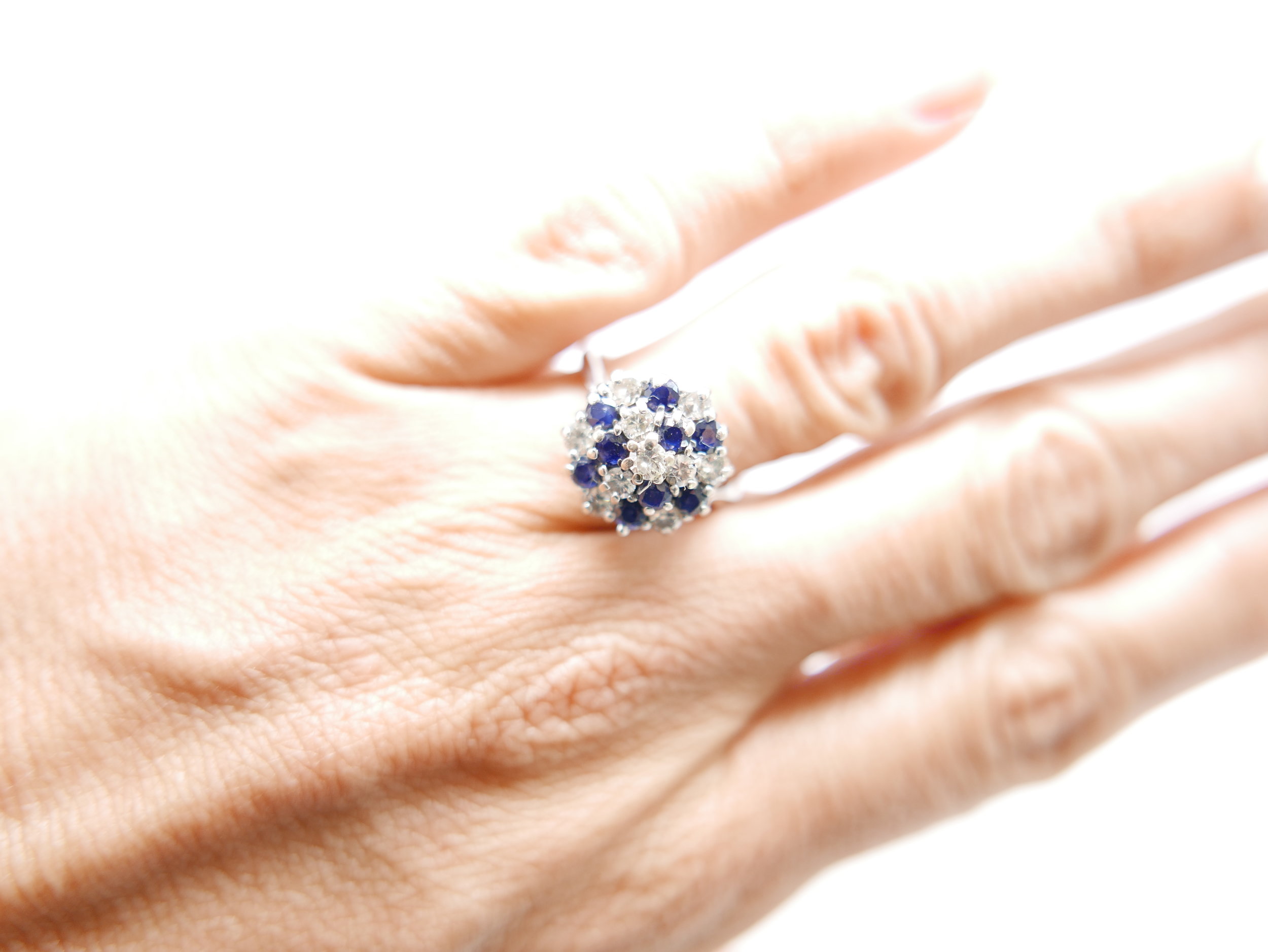 Vintage 18ct gold sapphire and diamond cluster ring, set with a mix of round cut sapphires and brilliant cut diamonds.