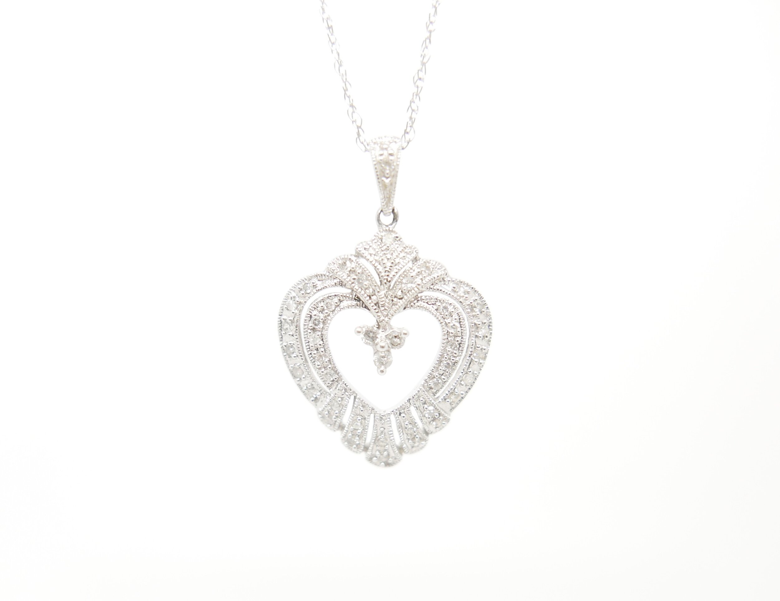 diamond heart necklace.jpeg