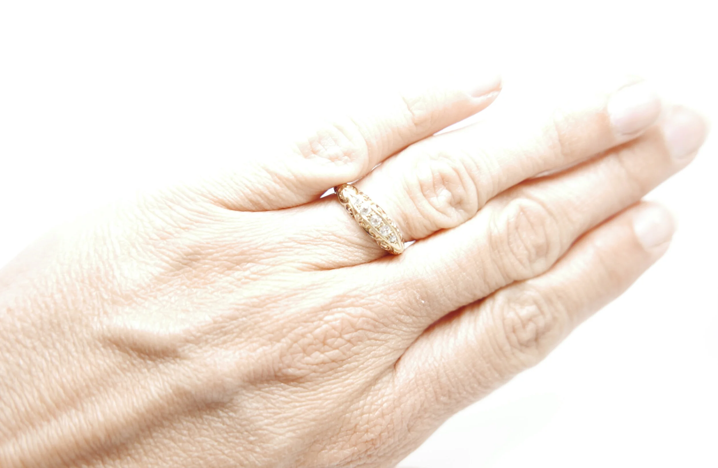 Lovely 18ct gold Edwardian boat ring, set with five old cut diamonds in this lovely intricate setting. Clearly marked Chester and 1919.