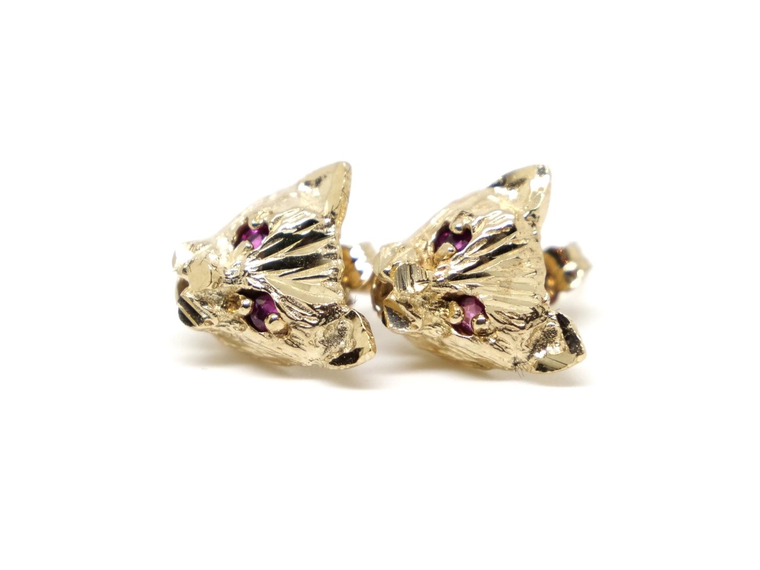 Very unusual 9ct gold vintage earrings in the design of a cat, set with rubies as eyes. With 9ct gold butterfly backs.