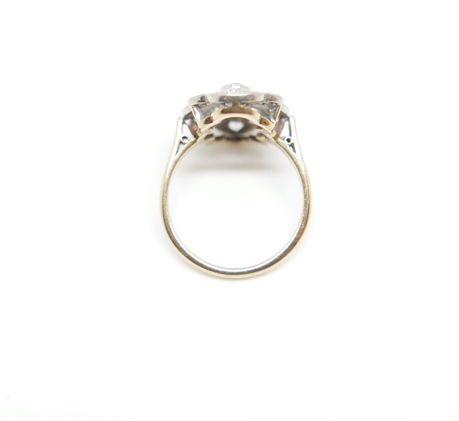 Art Deco Oval ring in platinum and 18ct white gold, set with three central sapphires and diamond surround. Pretty scalloped edges.