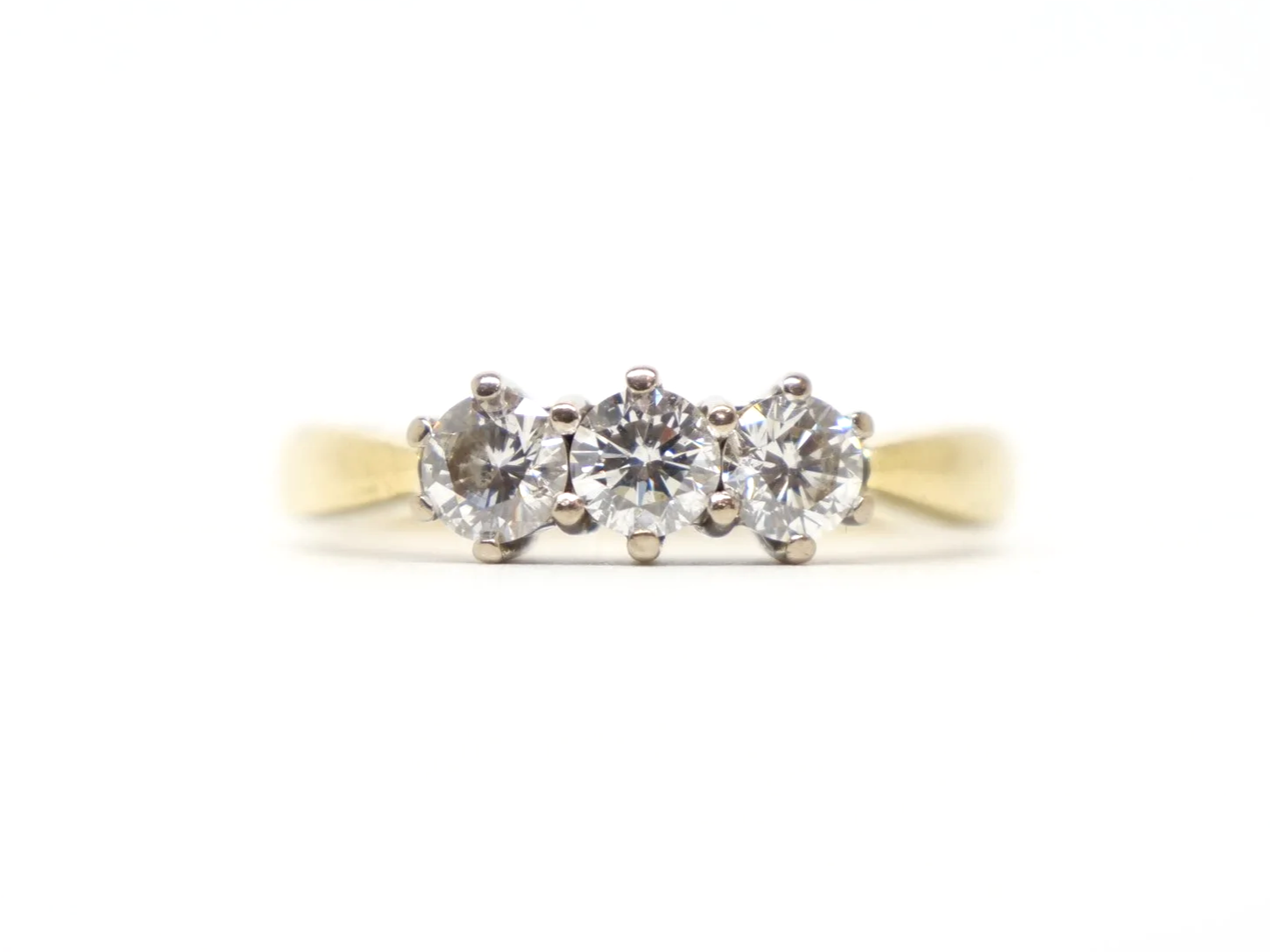18ct yellow gold three-stone diamond ring