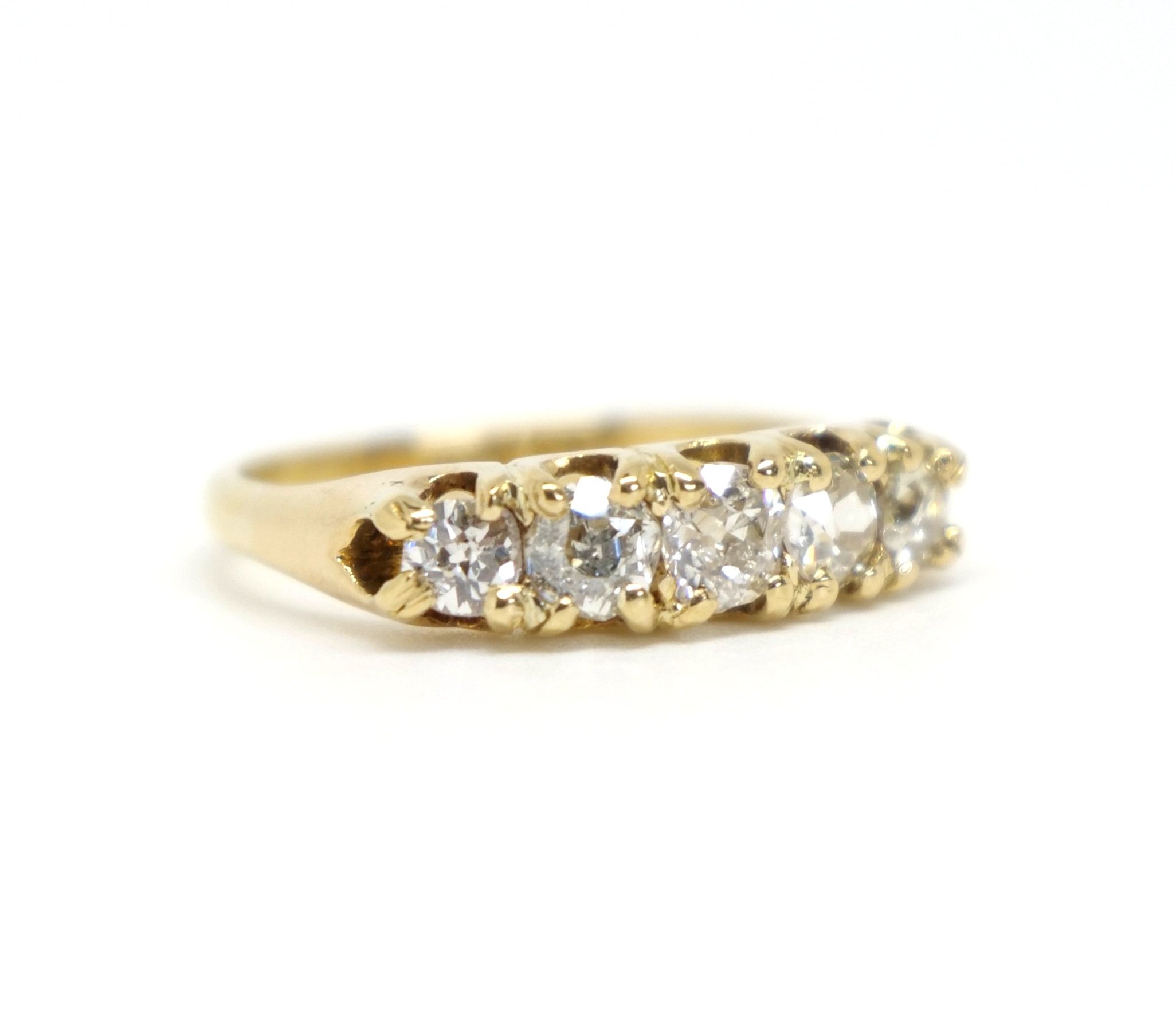 Beautiful 18ct gold vintage ring, set with five lovely old cut diamonds in this half hoop style. Approximately 0.85ct diamonds total.