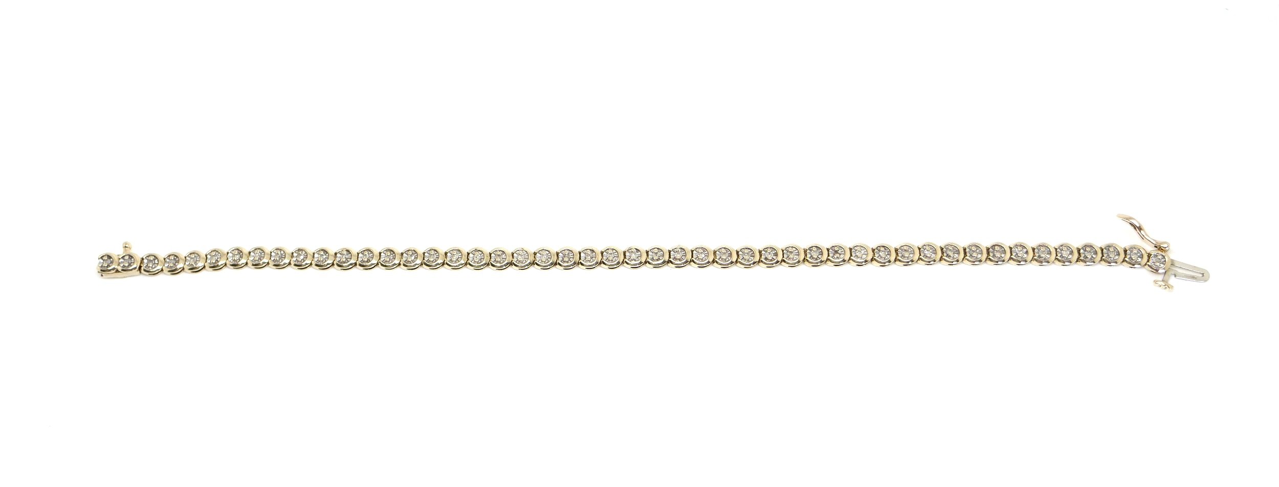 Very pretty 9ct gold diamond tennis bracelet, with each round link set with a small diamond. Total diamond weight 0.5cts.