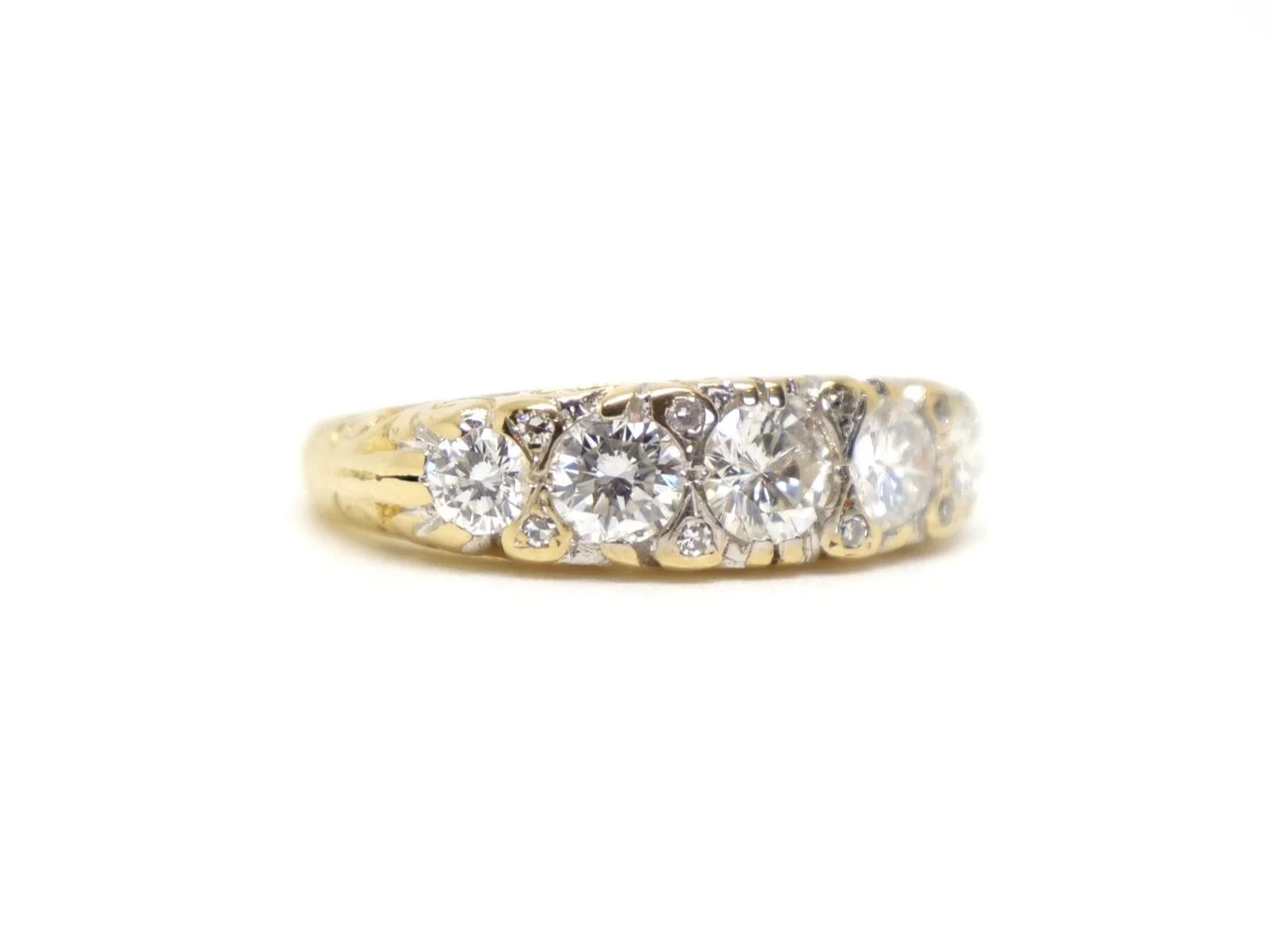 Superb vintage 18ct gold diamond five stone ring, set with a five beautiful brilliant cut diamonds of approximately 1ct total. Smaller diamonds set between.