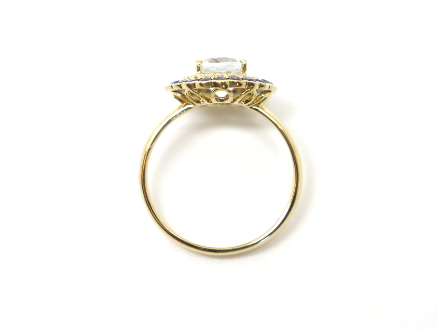 Very unusual 18ct gold aquamarine, diamond and sapphire cluster ring, set with a large central aquamarine and surrounded by diamonds and then sapphires.
