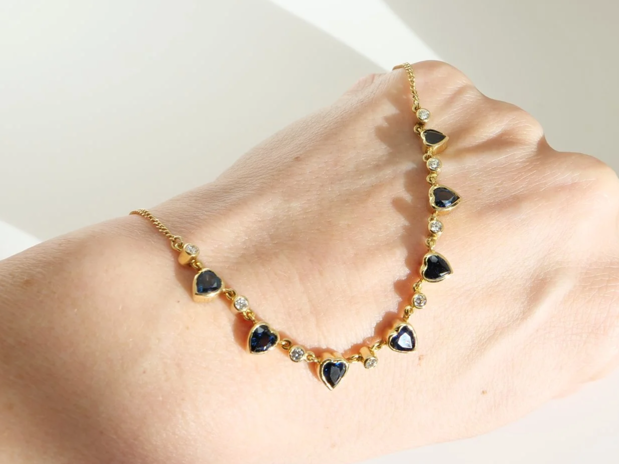 Unusual vintage 18ct gold sapphire heart and diamond necklace.