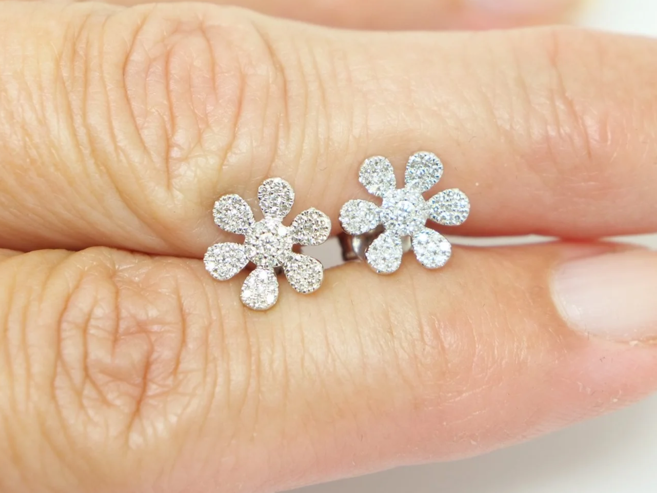 14ct gold diamond flower earrings in a delicate and pretty design