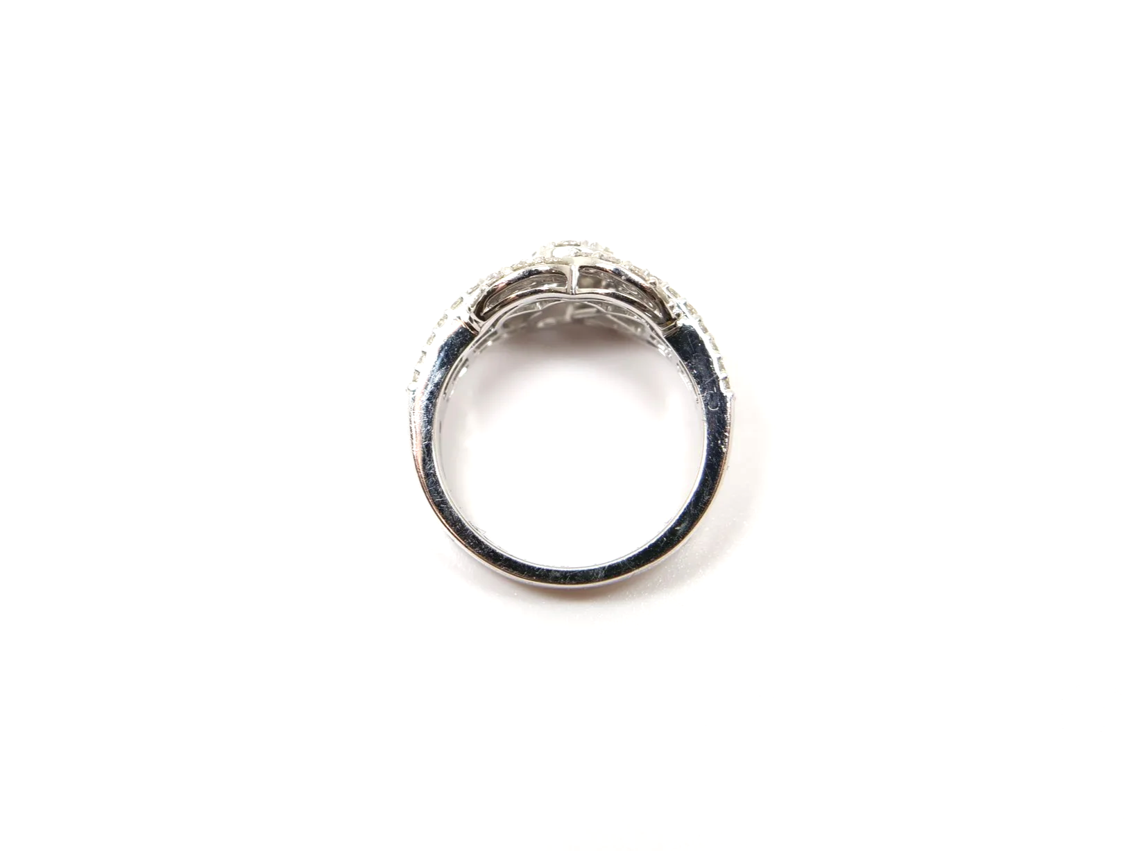 platinum diamond statement ring set with a combination of round brilliant and baguette cut diamonds totalling 1.258 carats.
