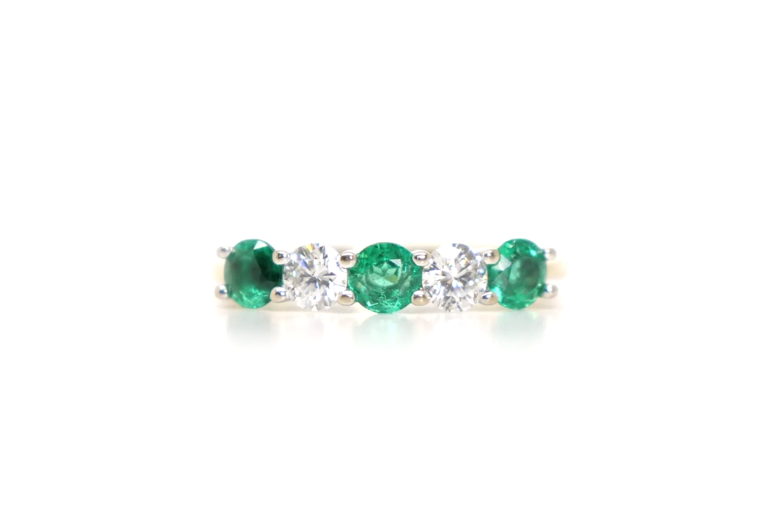 Lovely 18ct gold emerald and diamond five stone ring.