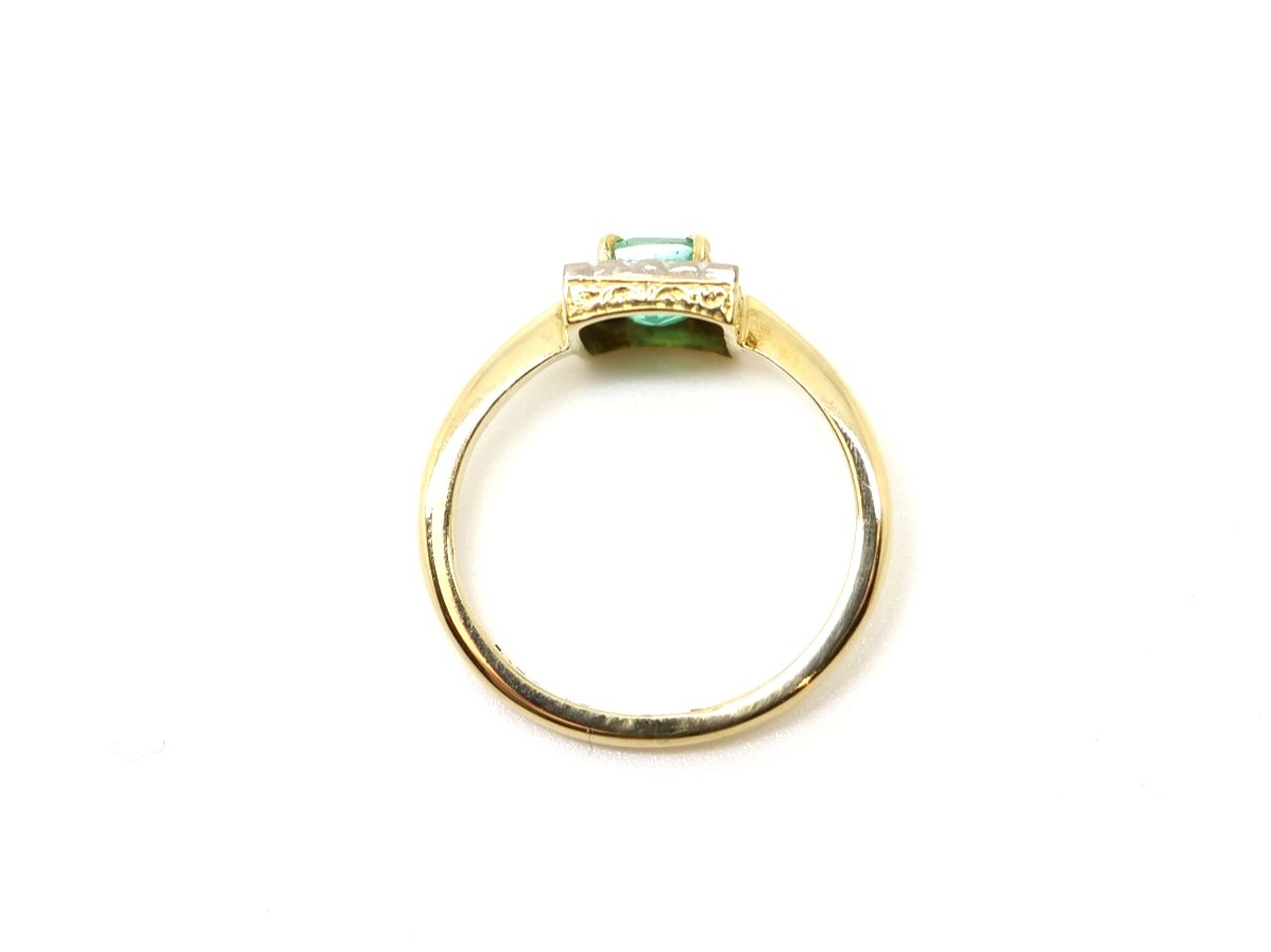Super vintage 18ct gold emerald and diamond ring, set with a central emerald cut emerald of approximately 0.35cts, surrounded by small, very sparkly diamonds.
