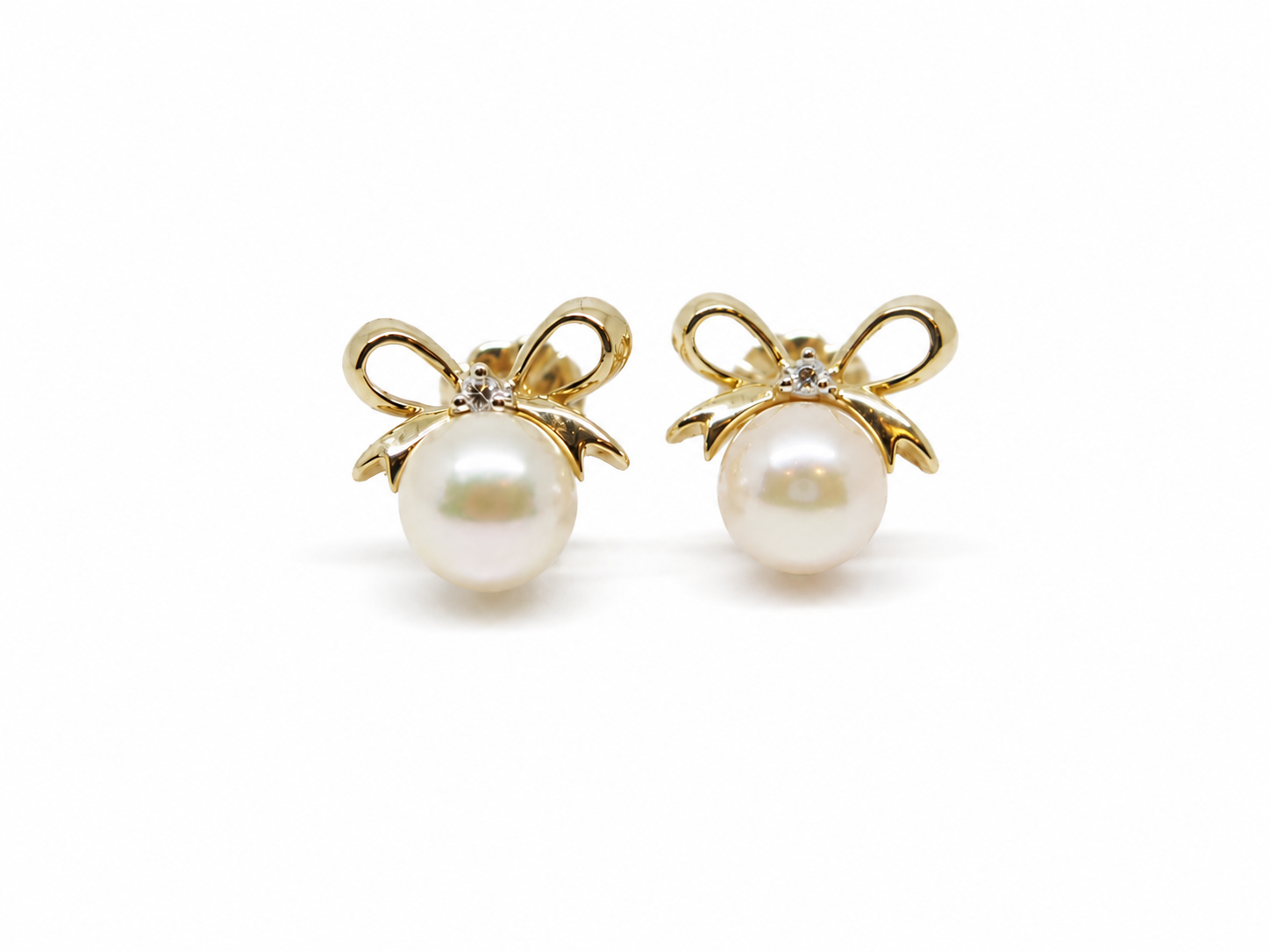 9ct yellow gold pearl and diamond bow stud earrings