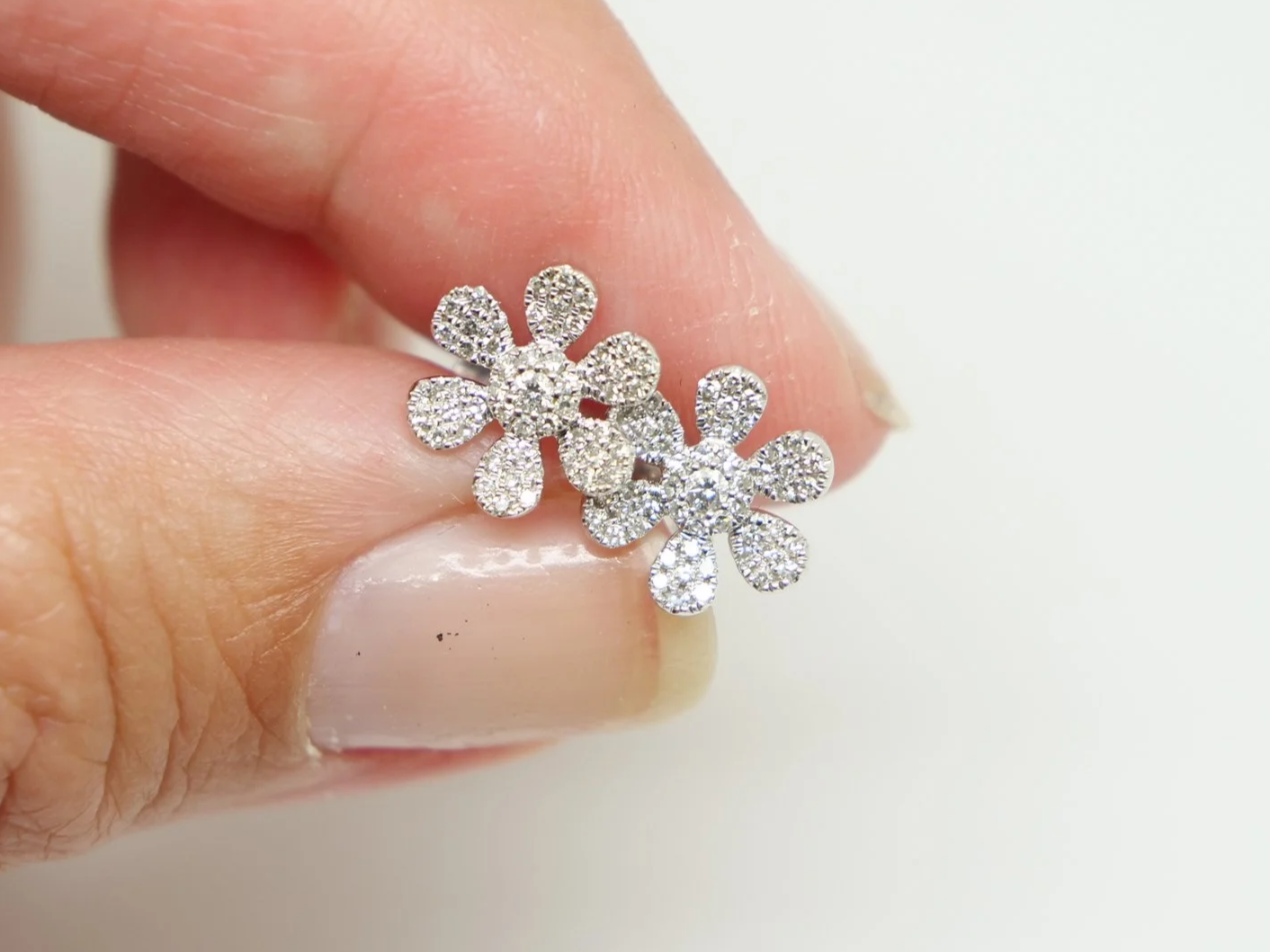 14ct gold diamond flower earrings in a delicate and pretty design