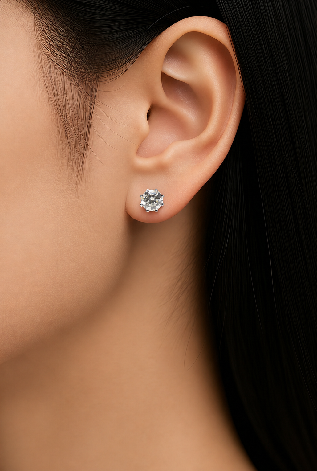 Lovely pair of 18ct white gold diamond stud earrings, each set with a round brilliant cut diamond of approximately 0.85 carats.