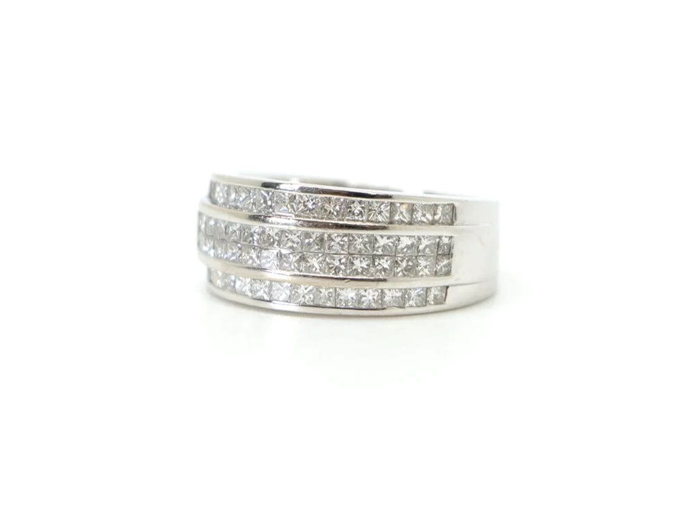 18ct white gold ring with three rows of channel-set princess cut diamonds
