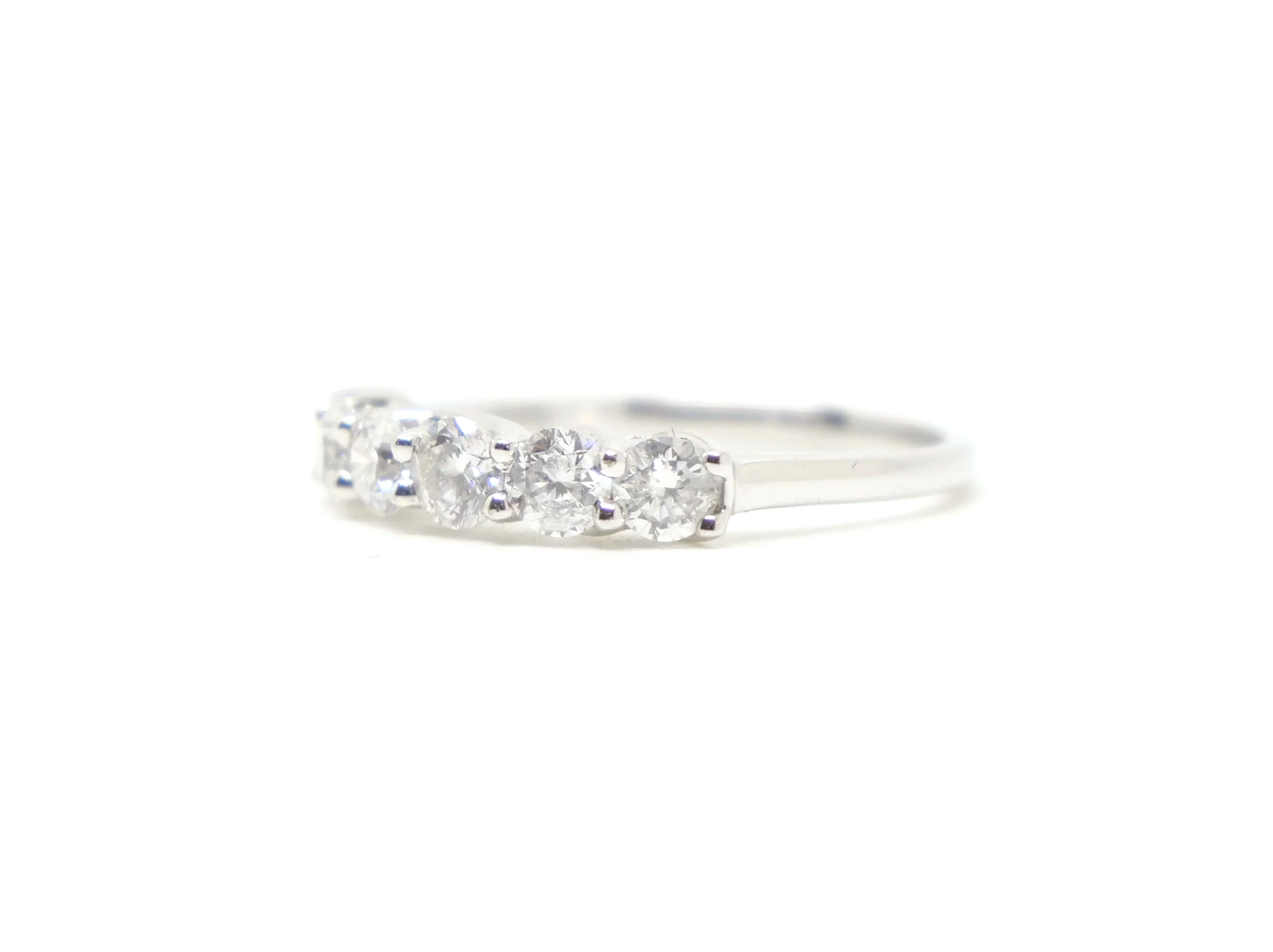Classic platinum diamond half eternity ring, set with six brilliant cut diamonds with a total diamond weight of 1ct.