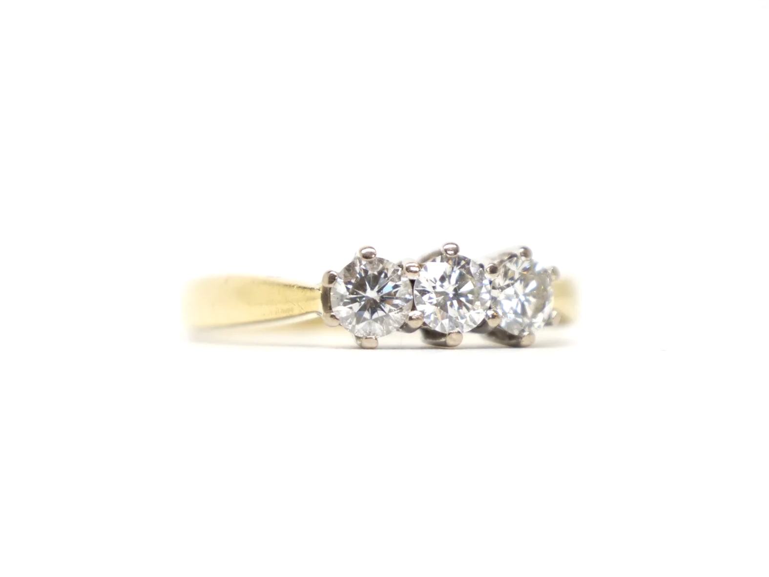 18ct yellow gold three-stone diamond ring