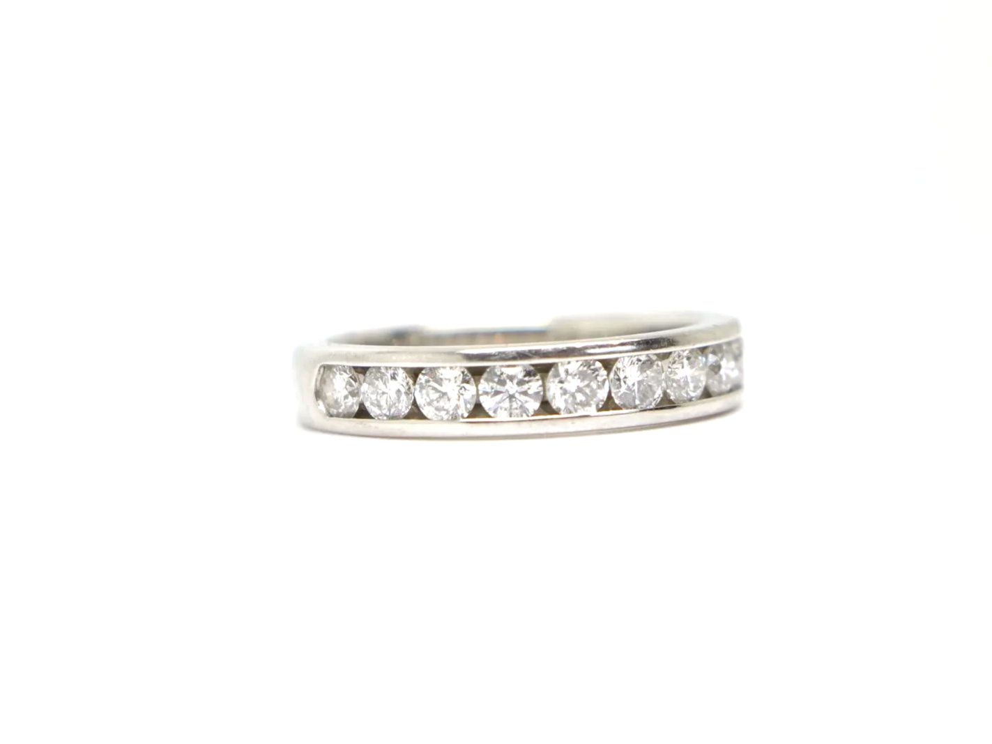 platinum channel-set diamond half eternity ring set