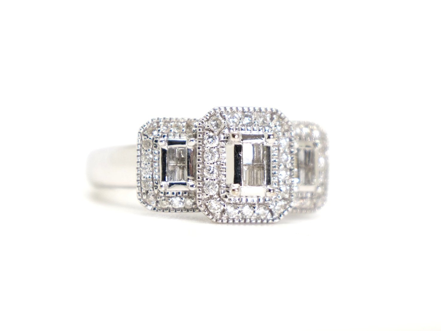 Lovely 18ct gold vintage style diamond cluster ring in a three stone design, set with a mixture of baguette cut and brilliant cut diamonds. Wonderful statement piece.