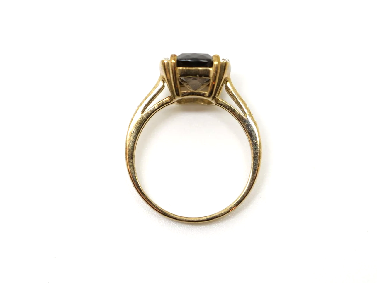Very pretty 9ct gold smoky quartz and diamond cocktail ring, set with a chequerboard cushion cut smokey quartz and with diamonds to each side and down each shoulder.