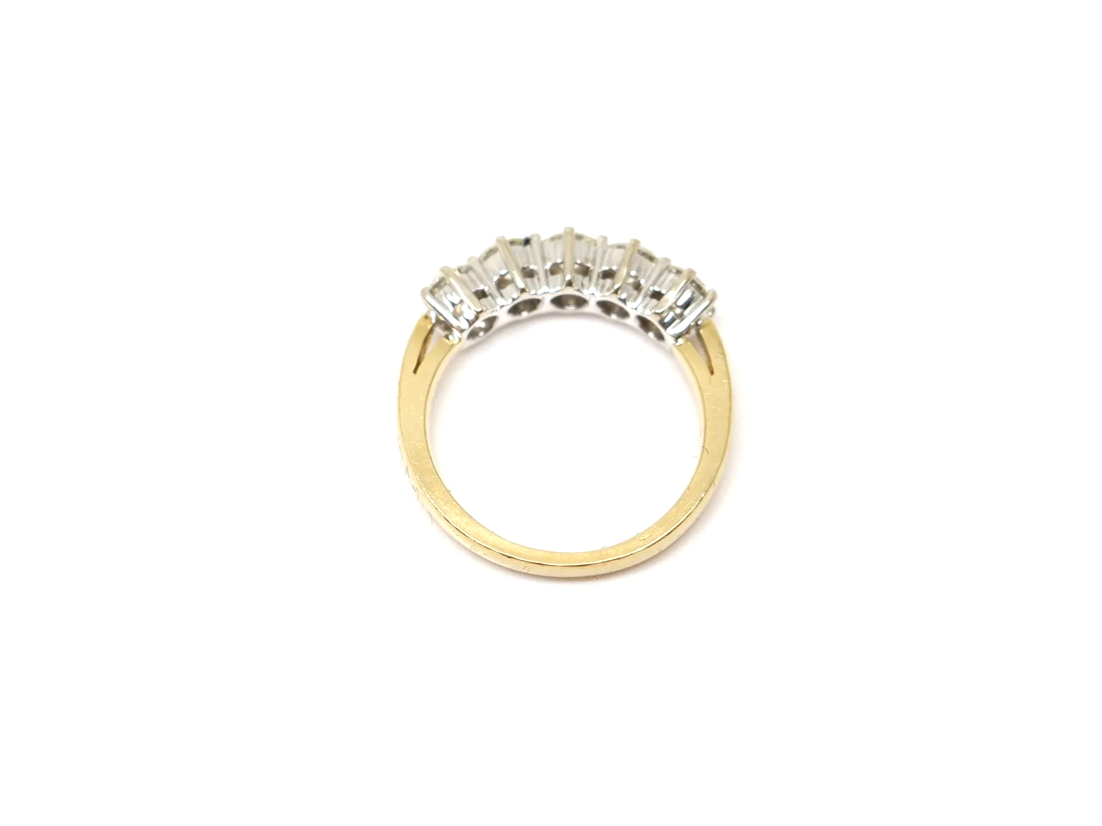 A classic five stone diamond ring in 18ct gold, set with five round brilliant cut diamonds of 1 carat in total.