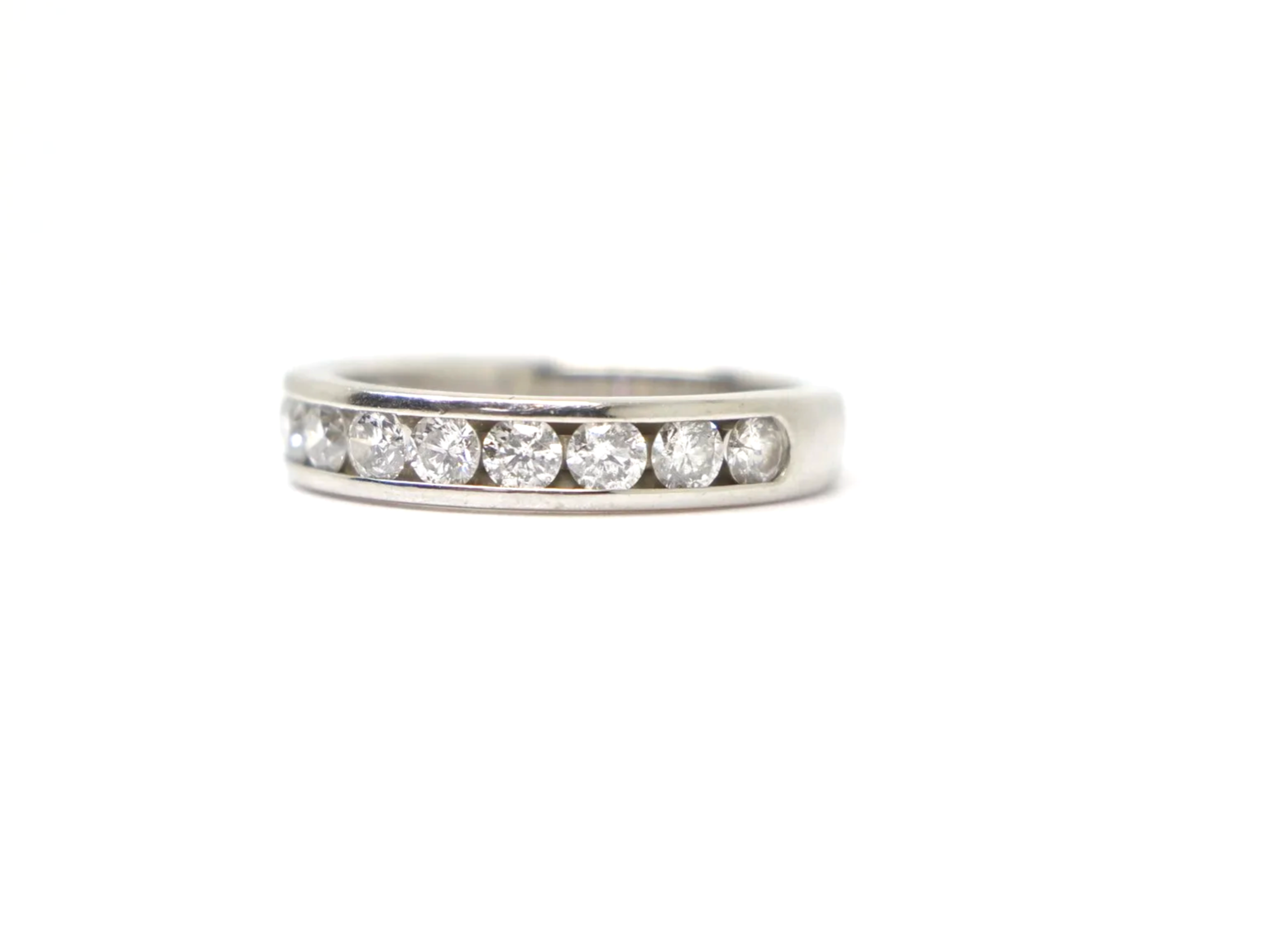 platinum channel-set diamond half eternity ring set