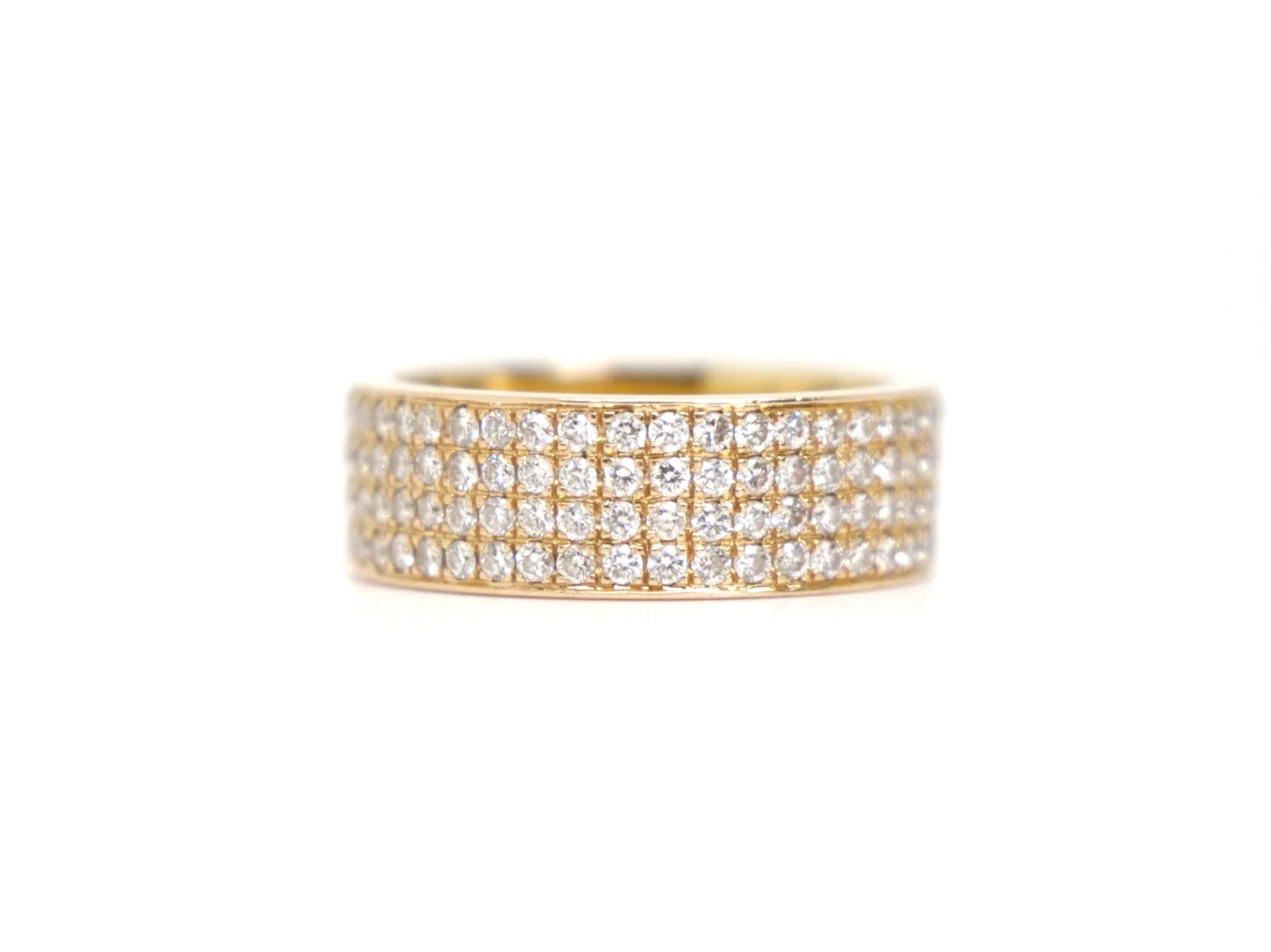 18ct yellow gold full eternity ring set with four continuous rows of round brilliant cut diamonds