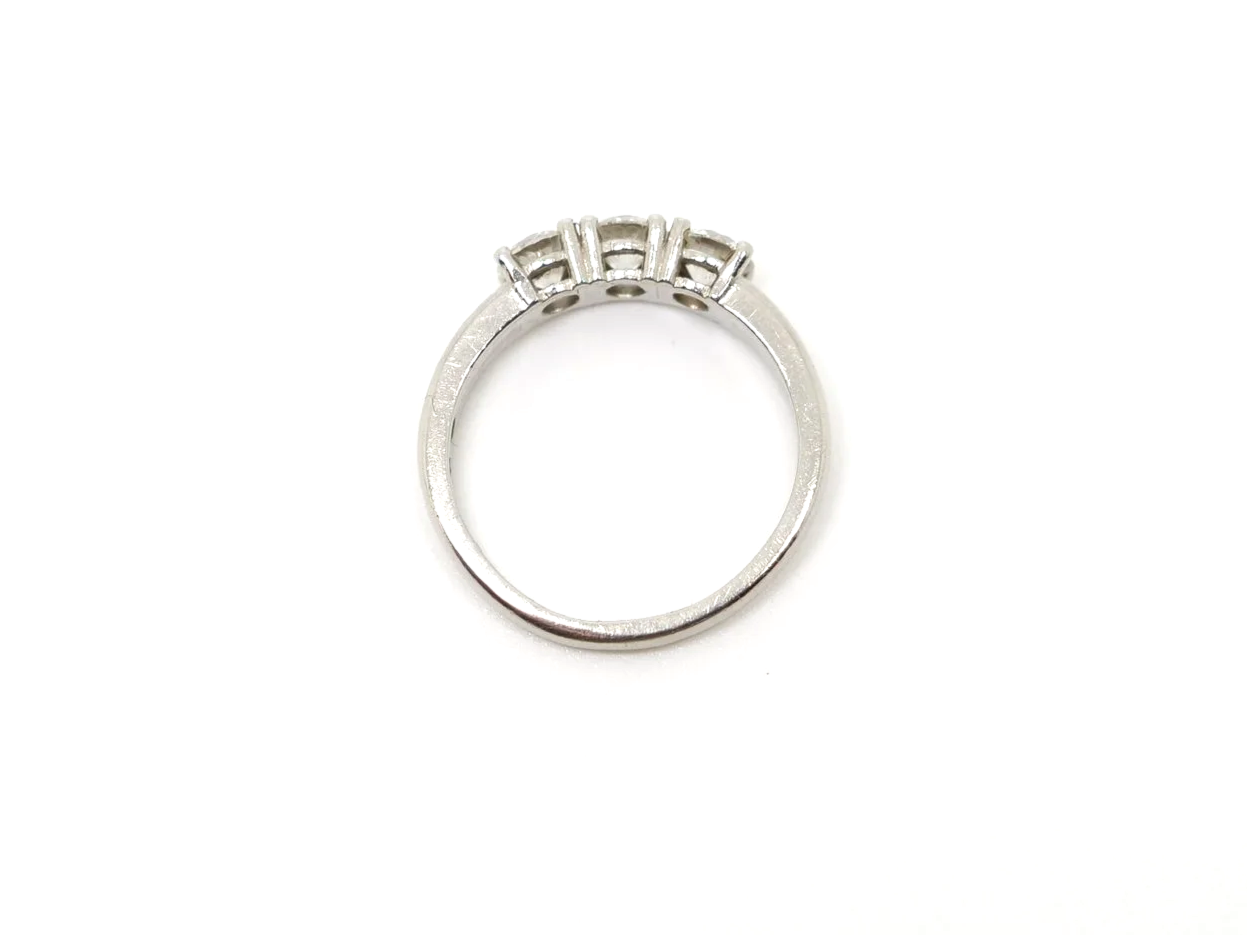 Platinum diamond three stone ring, round brilliant cut diamonds