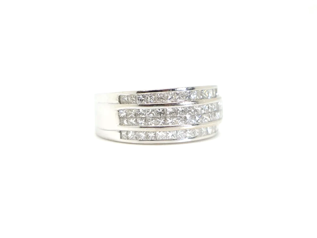 18ct white gold ring with three rows of channel-set princess cut diamonds
