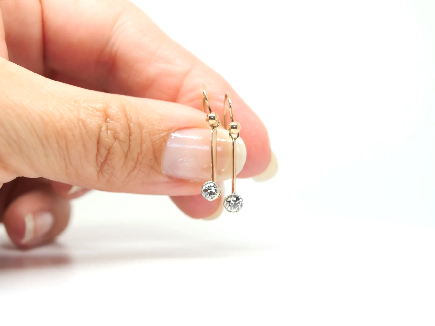 A pair of vintage 15ct gold diamond drop earrings