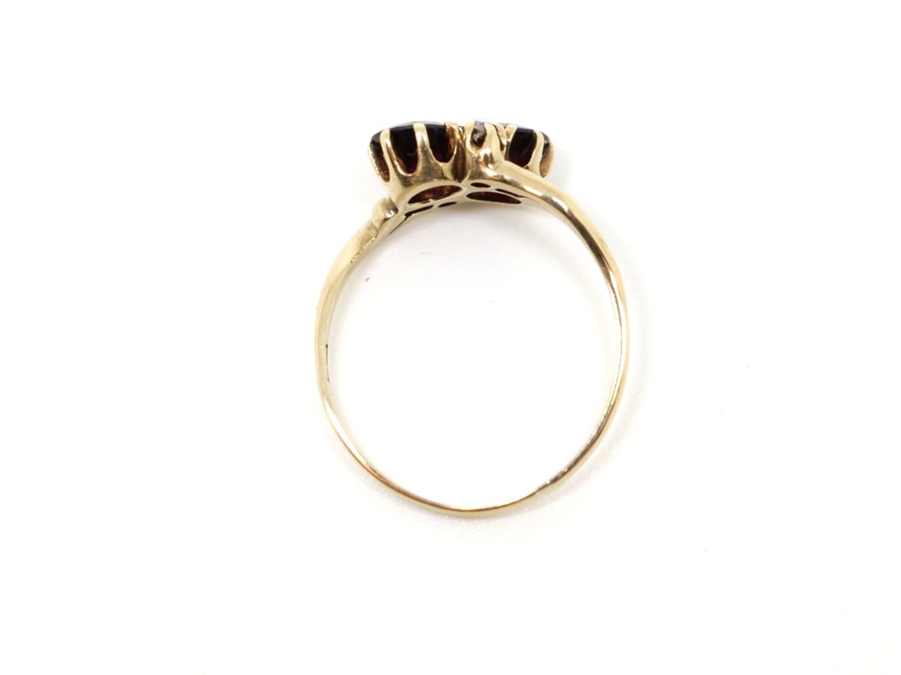 Very pretty 15ct gold garnet and diamond ring, set with two round cut garnets and two old cut diamonds. The garnets are particularly pretty and show fantastic colours in the light.