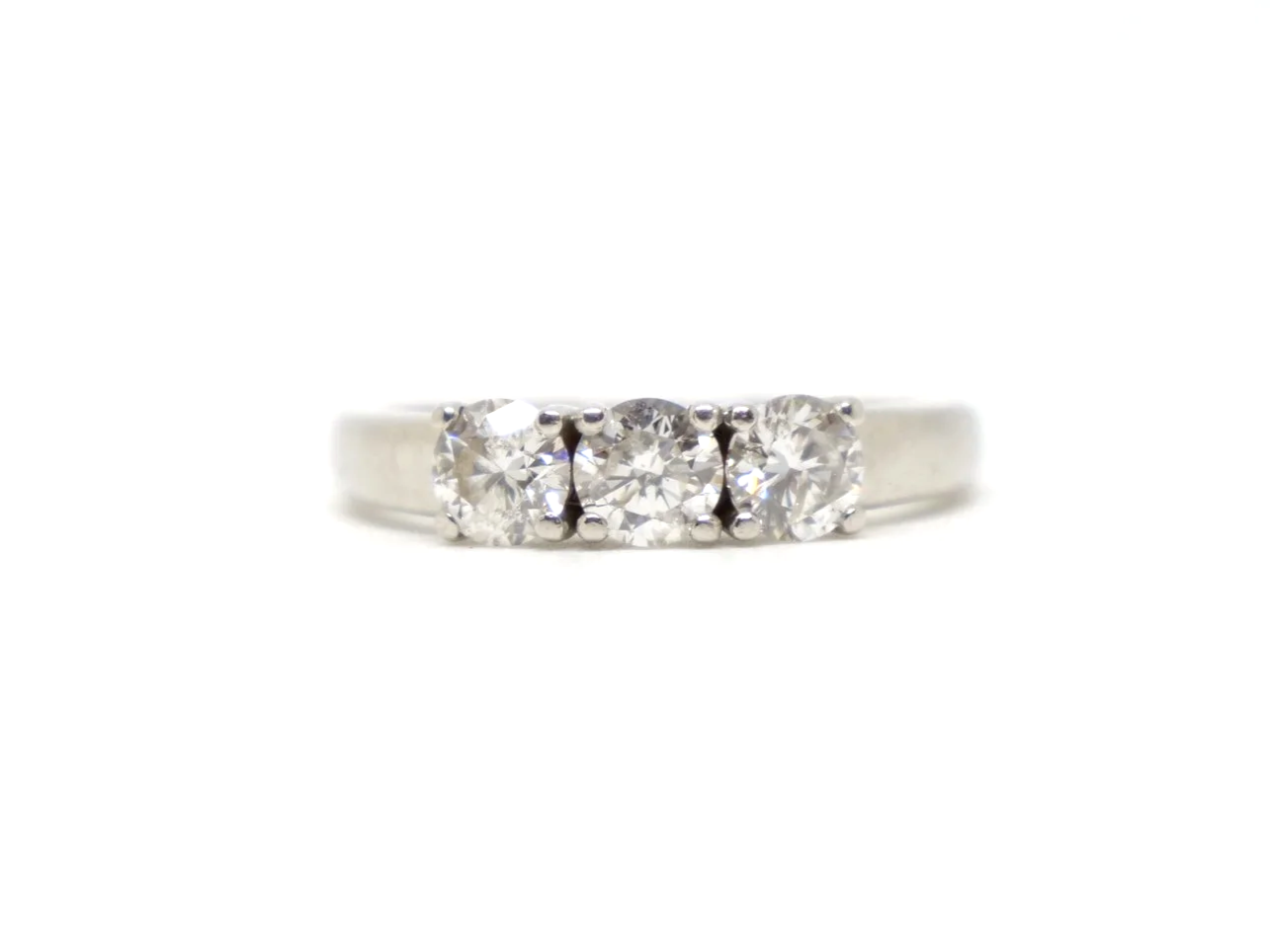 Platinum diamond three stone ring, round brilliant cut diamonds